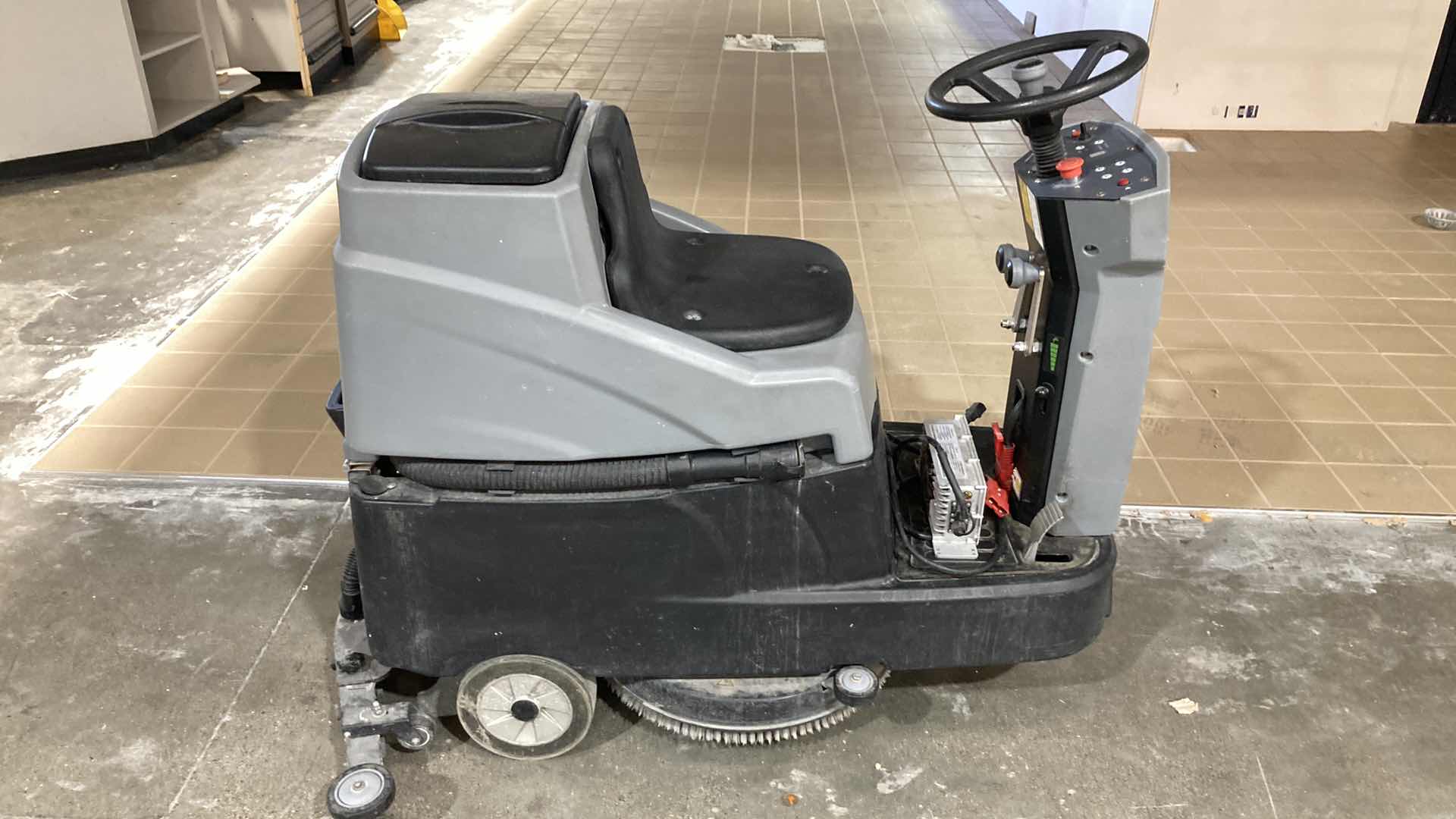 Photo 1 of SHENG YANG COMPACT RIDE-ON FLOOR SCRUBBER MODEL A60 W BATTERY CHARGER