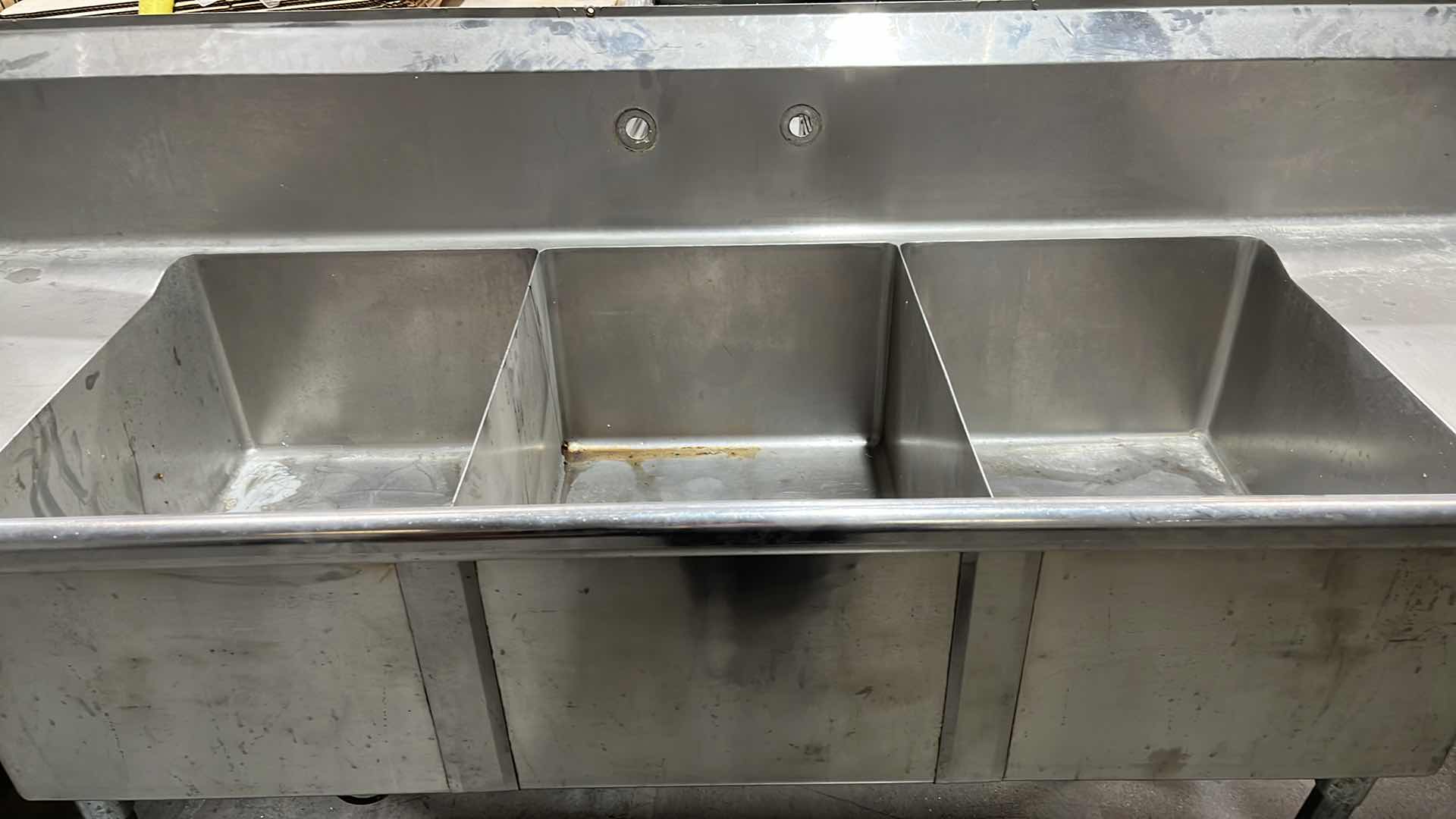 Photo 1 of STAINLESS STEEL COMMERCIAL THREE COMPARTMENT KITCHEN SINK W TWO DRAINBOARDS 29.75” X 90”