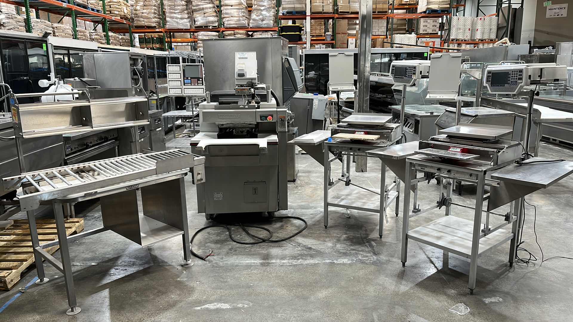 Photo 1 of HOBART COMMERCIAL DIGITAL DELI WRAPPING MACHINE W LABEL PRINTER MODEL UWS (HARDWIRED),  HEAT SEAL ENERGY SMART WRAPPER STATION W QUANTUM LABEL PRINTER (2),
HOBART ROLLER/DISCHARGE TABLE (MODEL HRT5-3)