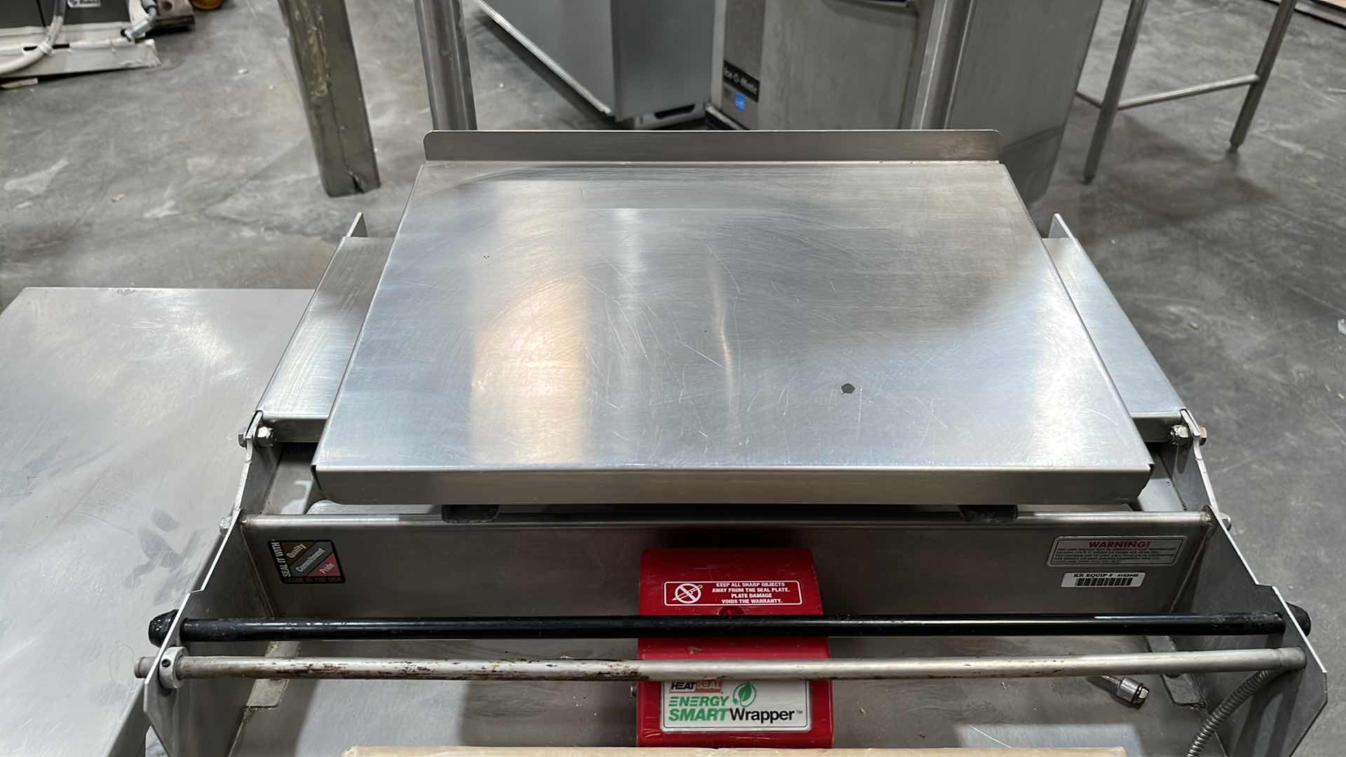 Photo 16 of HOBART COMMERCIAL DIGITAL DELI WRAPPING MACHINE W LABEL PRINTER MODEL UWS (HARDWIRED),  HEAT SEAL ENERGY SMART WRAPPER STATION W QUANTUM LABEL PRINTER (2),
HOBART ROLLER/DISCHARGE TABLE (MODEL HRT5-3)