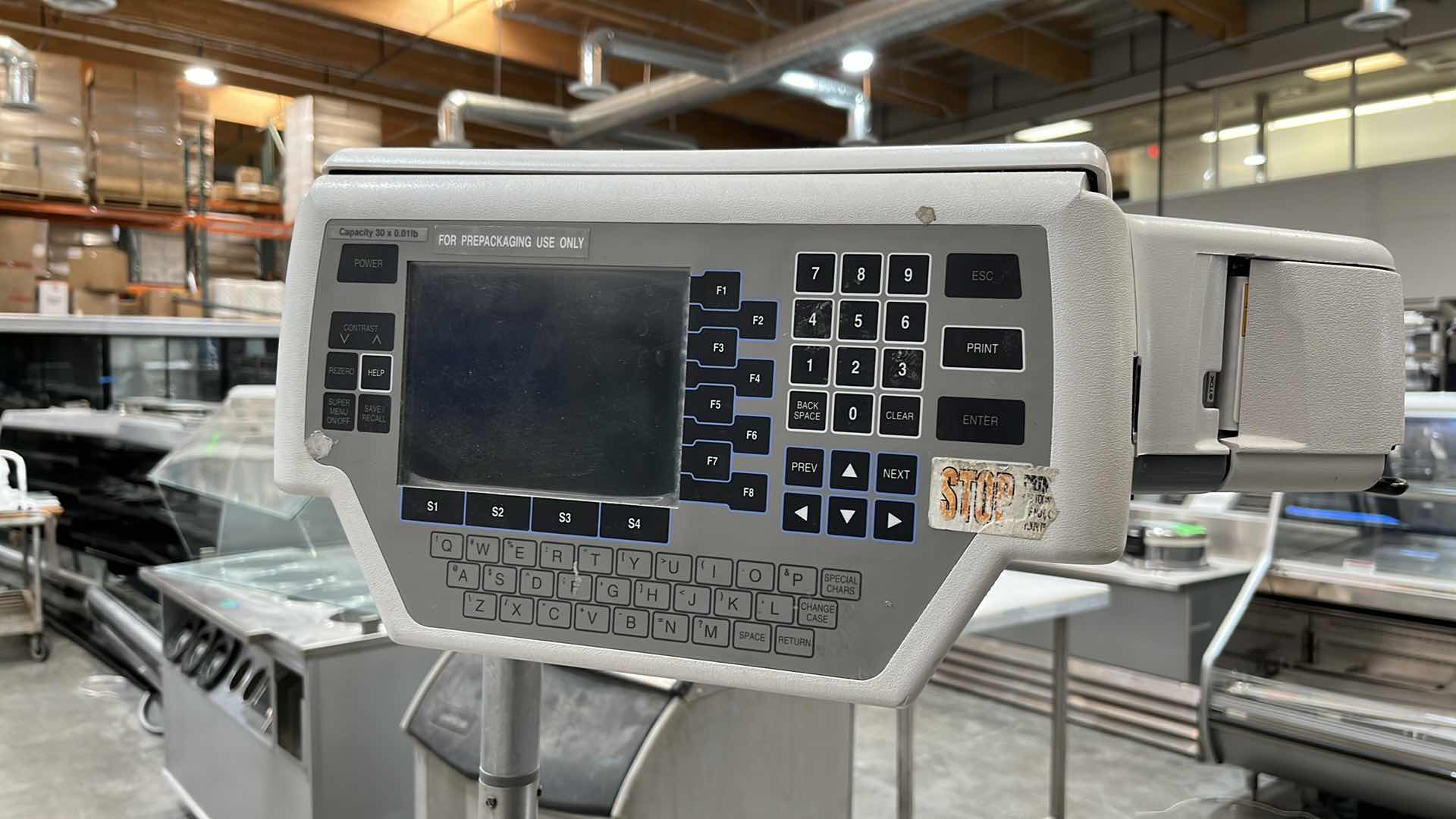 Photo 18 of HOBART COMMERCIAL DIGITAL DELI WRAPPING MACHINE W LABEL PRINTER MODEL UWS (HARDWIRED),  HEAT SEAL ENERGY SMART WRAPPER STATION W QUANTUM LABEL PRINTER (2),
HOBART ROLLER/DISCHARGE TABLE (MODEL HRT5-3)