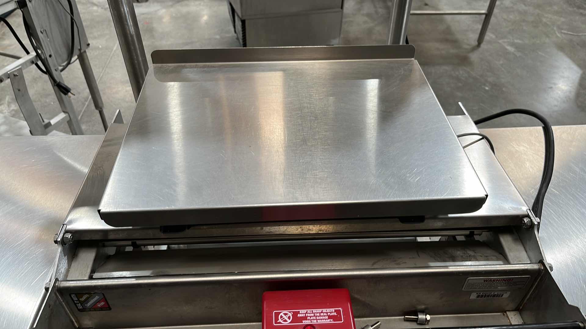 Photo 31 of HOBART COMMERCIAL DIGITAL DELI WRAPPING MACHINE W LABEL PRINTER MODEL UWS (HARDWIRED),  HEAT SEAL ENERGY SMART WRAPPER STATION W QUANTUM LABEL PRINTER (2),
HOBART ROLLER/DISCHARGE TABLE (MODEL HRT5-3)