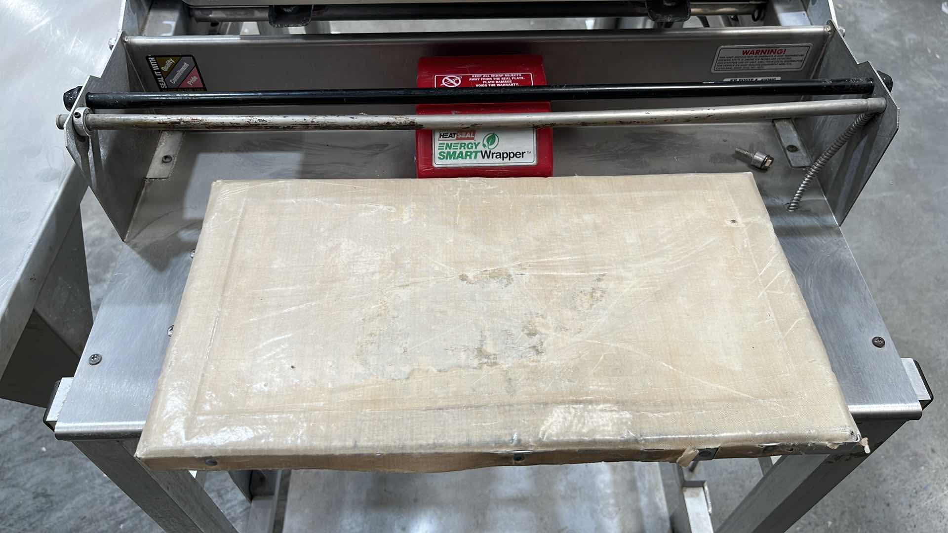 Photo 17 of HOBART COMMERCIAL DIGITAL DELI WRAPPING MACHINE W LABEL PRINTER MODEL UWS (HARDWIRED),  HEAT SEAL ENERGY SMART WRAPPER STATION W QUANTUM LABEL PRINTER (2),
HOBART ROLLER/DISCHARGE TABLE (MODEL HRT5-3)