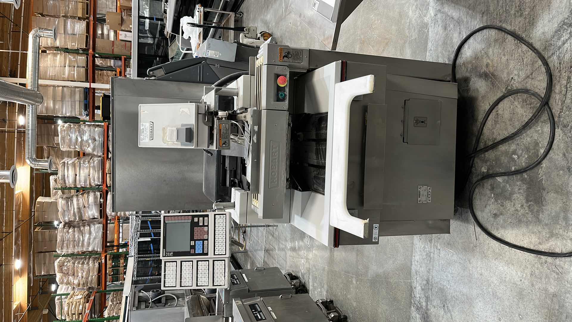 Photo 2 of HOBART COMMERCIAL DIGITAL DELI WRAPPING MACHINE W LABEL PRINTER MODEL UWS (HARDWIRED),  HEAT SEAL ENERGY SMART WRAPPER STATION W QUANTUM LABEL PRINTER (2),
HOBART ROLLER/DISCHARGE TABLE (MODEL HRT5-3)