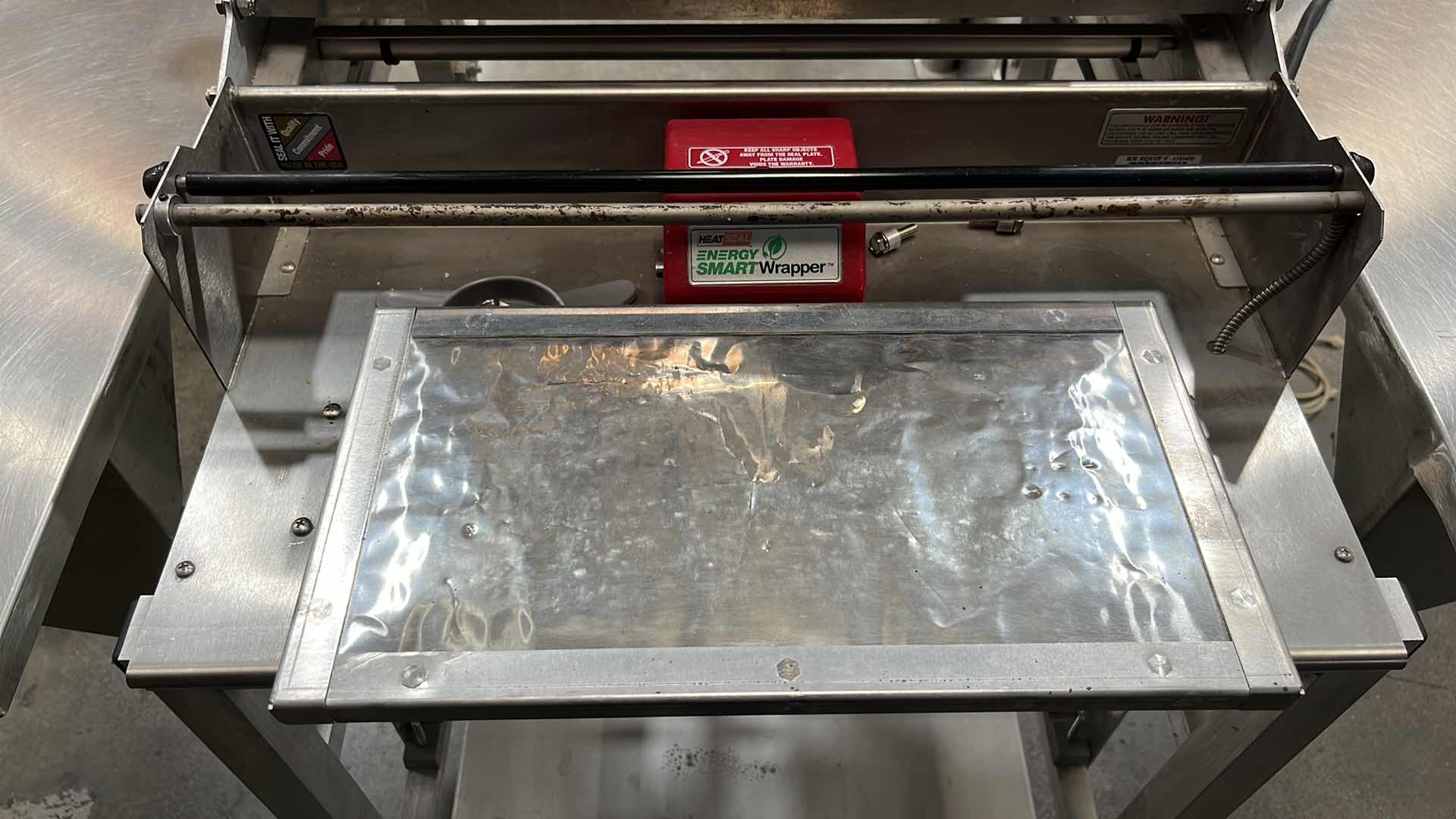 Photo 32 of HOBART COMMERCIAL DIGITAL DELI WRAPPING MACHINE W LABEL PRINTER MODEL UWS (HARDWIRED),  HEAT SEAL ENERGY SMART WRAPPER STATION W QUANTUM LABEL PRINTER (2),
HOBART ROLLER/DISCHARGE TABLE (MODEL HRT5-3)