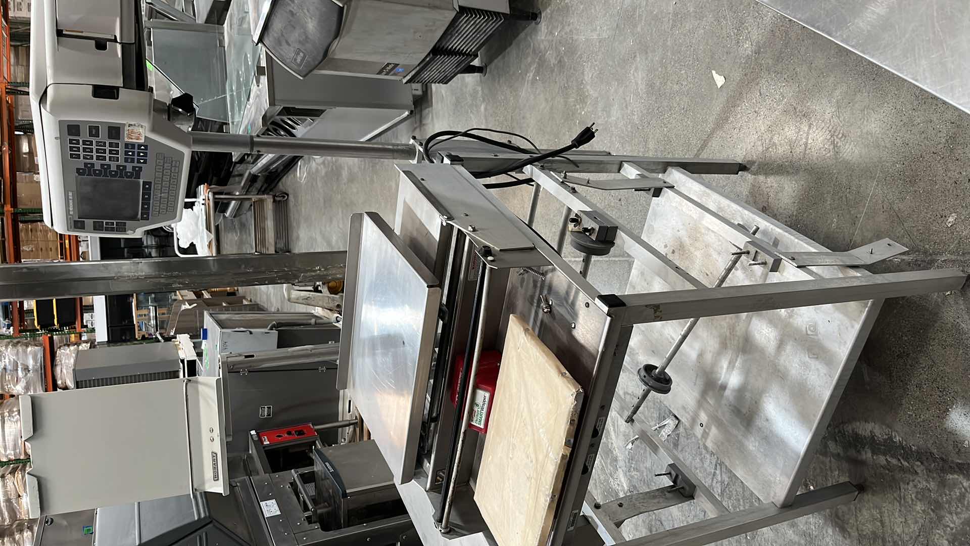 Photo 15 of HOBART COMMERCIAL DIGITAL DELI WRAPPING MACHINE W LABEL PRINTER MODEL UWS (HARDWIRED),  HEAT SEAL ENERGY SMART WRAPPER STATION W QUANTUM LABEL PRINTER (2),
HOBART ROLLER/DISCHARGE TABLE (MODEL HRT5-3)