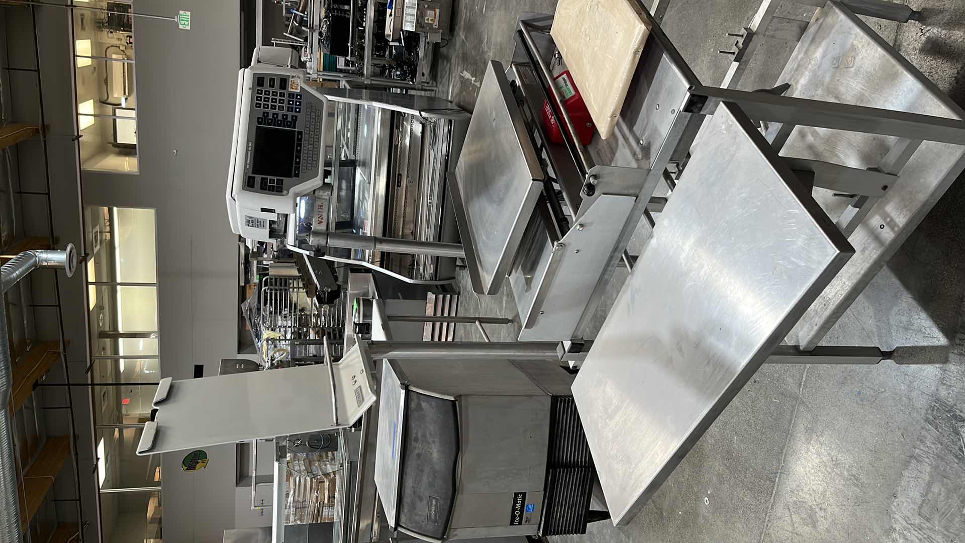 Photo 14 of HOBART COMMERCIAL DIGITAL DELI WRAPPING MACHINE W LABEL PRINTER MODEL UWS (HARDWIRED),  HEAT SEAL ENERGY SMART WRAPPER STATION W QUANTUM LABEL PRINTER (2),
HOBART ROLLER/DISCHARGE TABLE (MODEL HRT5-3)