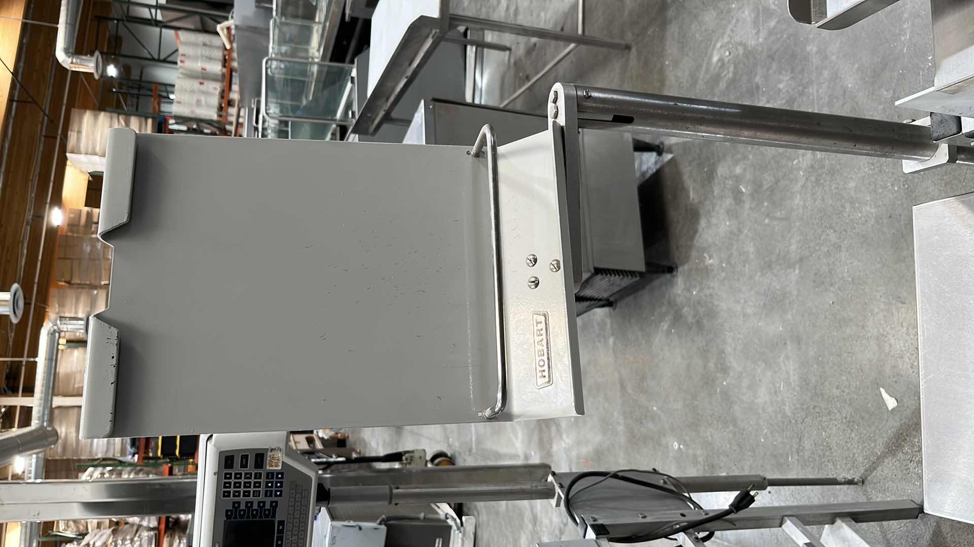 Photo 38 of HOBART COMMERCIAL DIGITAL DELI WRAPPING MACHINE W LABEL PRINTER MODEL UWS (HARDWIRED),  HEAT SEAL ENERGY SMART WRAPPER STATION W QUANTUM LABEL PRINTER (2),
HOBART ROLLER/DISCHARGE TABLE (MODEL HRT5-3)