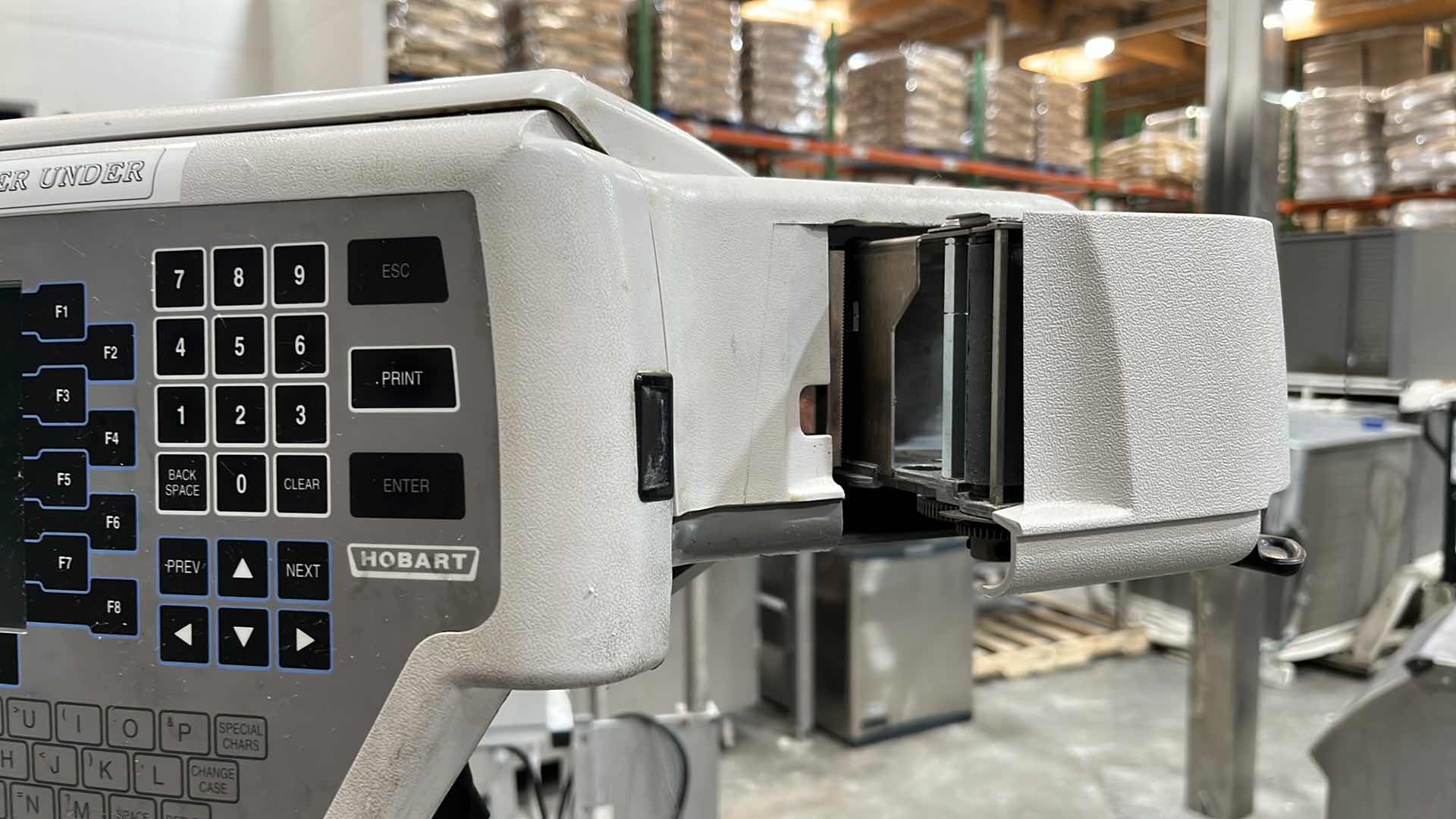 Photo 1 of HOBART COMMERCIAL DIGITAL DELI WRAPPING MACHINE W LABEL PRINTER MODEL UWS (HARDWIRED),  HEAT SEAL ENERGY SMART WRAPPER STATION W QUANTUM LABEL PRINTER (2),
HOBART ROLLER/DISCHARGE TABLE (MODEL HRT5-3)
