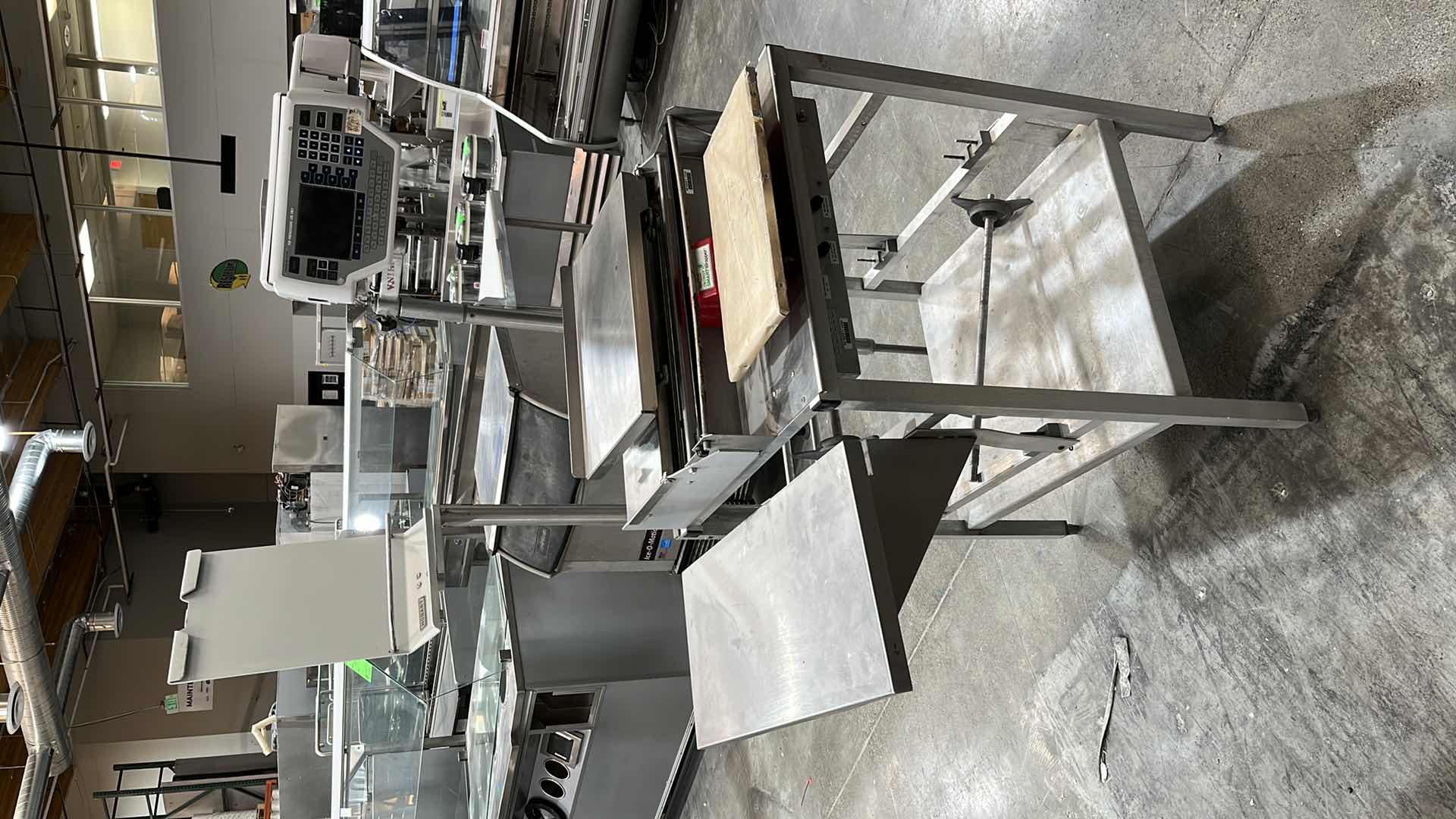 Photo 13 of HOBART COMMERCIAL DIGITAL DELI WRAPPING MACHINE W LABEL PRINTER MODEL UWS (HARDWIRED),  HEAT SEAL ENERGY SMART WRAPPER STATION W QUANTUM LABEL PRINTER (2),
HOBART ROLLER/DISCHARGE TABLE (MODEL HRT5-3)