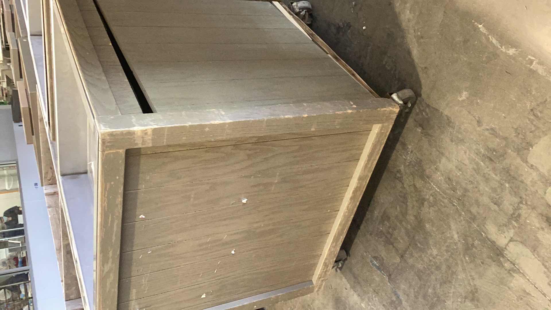 Photo 1 of LARGE WOODEN FRUIT DISPLAY WITH WHEELS, METAL TOP, AND DRAINAGE 30” X 30” H 34”