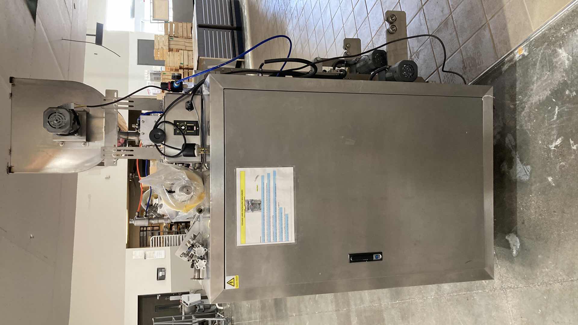 Photo 1 of LANDPACK COMMERCIAL AUTOMATIC LIQUID PACKAGING MACHINE MODEL LD-420L