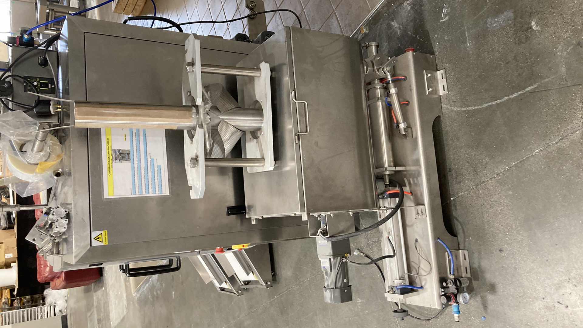 Photo 1 of LANDPACK COMMERCIAL AUTOMATIC LIQUID PACKAGING MACHINE MODEL LD-420L