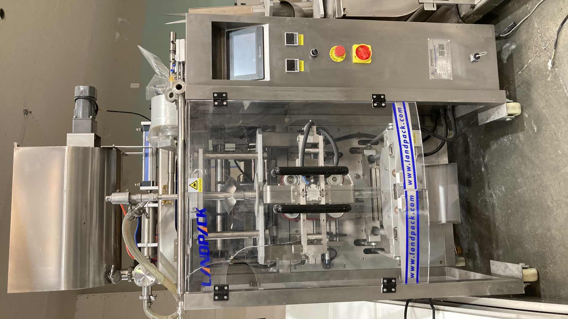 Photo 1 of LANDPACK COMMERCIAL AUTOMATIC LIQUID PACKAGING MACHINE MODEL LD-420L