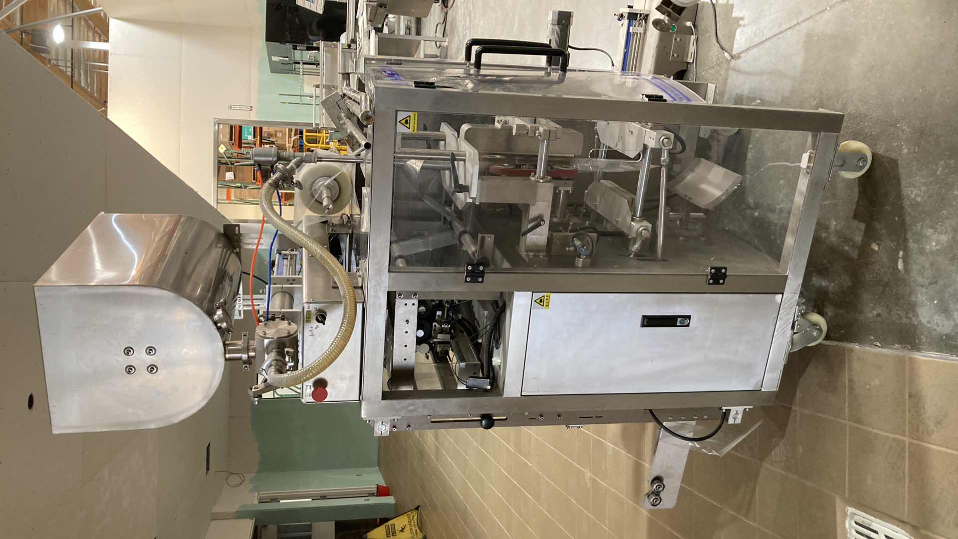 Photo 1 of LANDPACK COMMERCIAL AUTOMATIC LIQUID PACKAGING MACHINE MODEL LD-420L