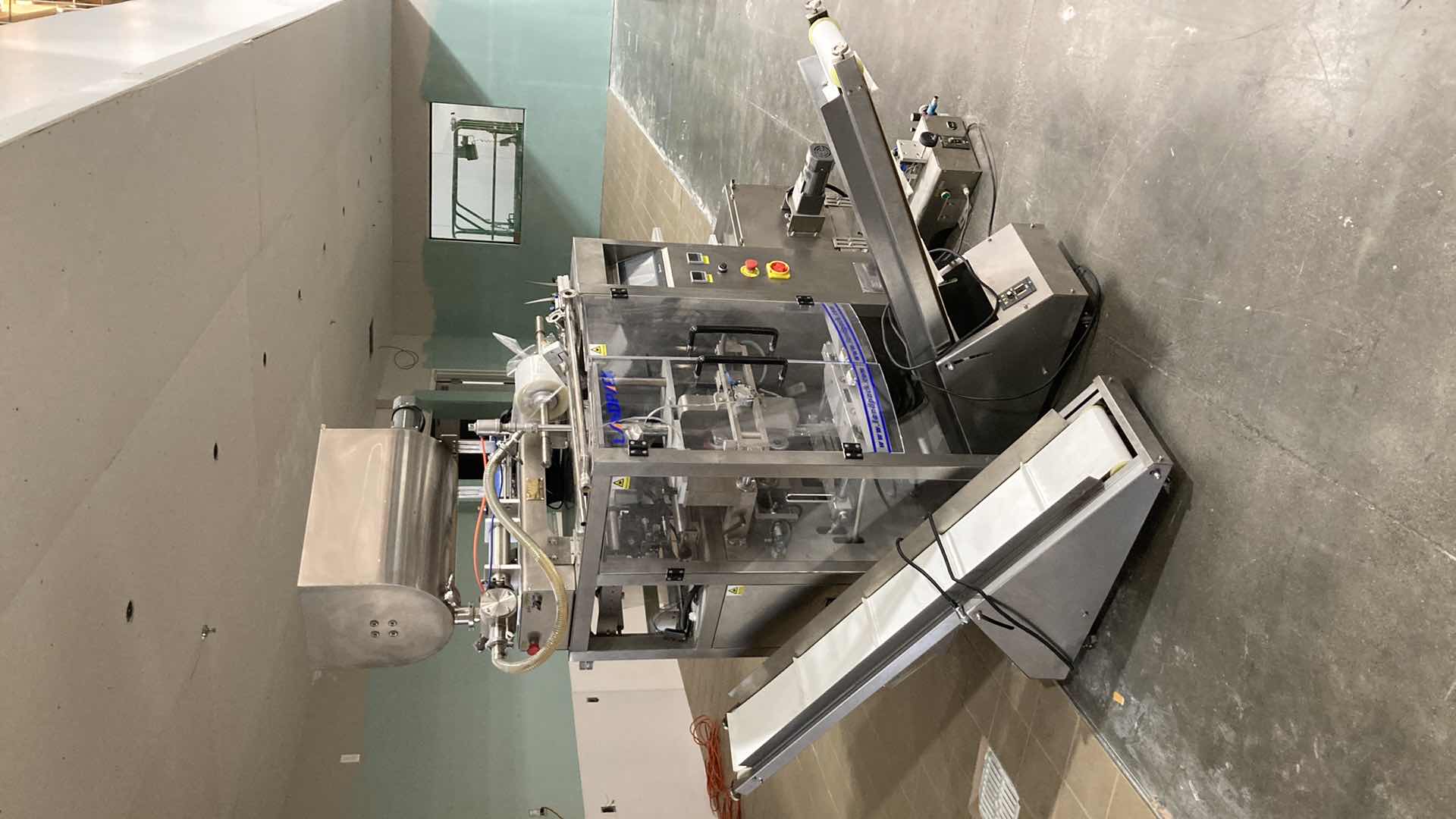 Photo 1 of LANDPACK COMMERCIAL AUTOMATIC LIQUID PACKAGING MACHINE MODEL LD-420L