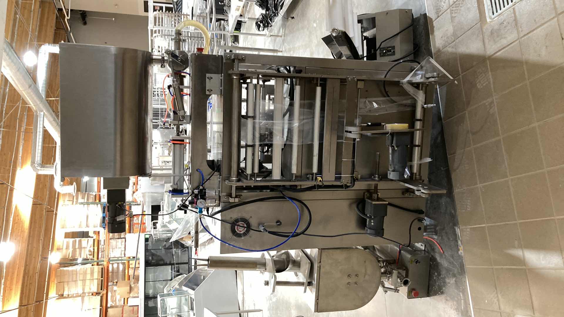 Photo 1 of LANDPACK COMMERCIAL AUTOMATIC LIQUID PACKAGING MACHINE MODEL LD-420L