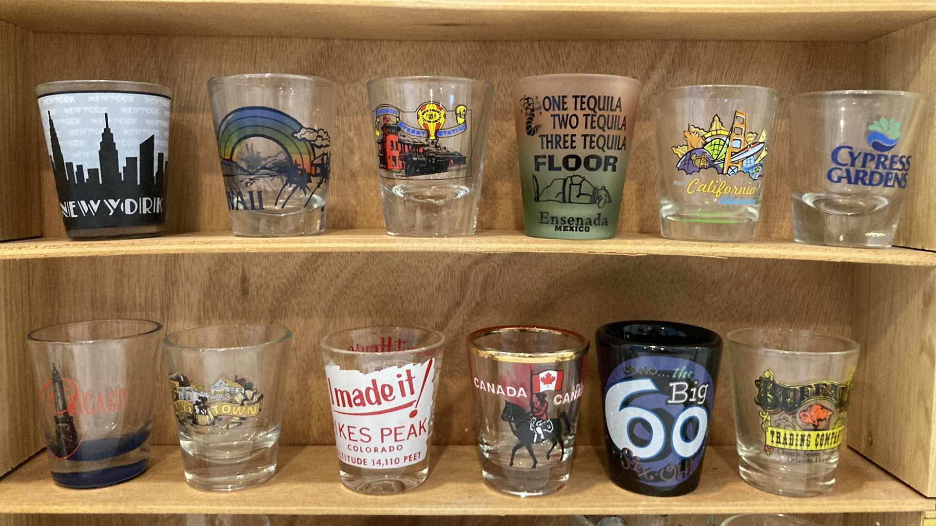 Photo 1 of SHOT GLASS COLLECTION W GLASS DOOR WOOD CABINET