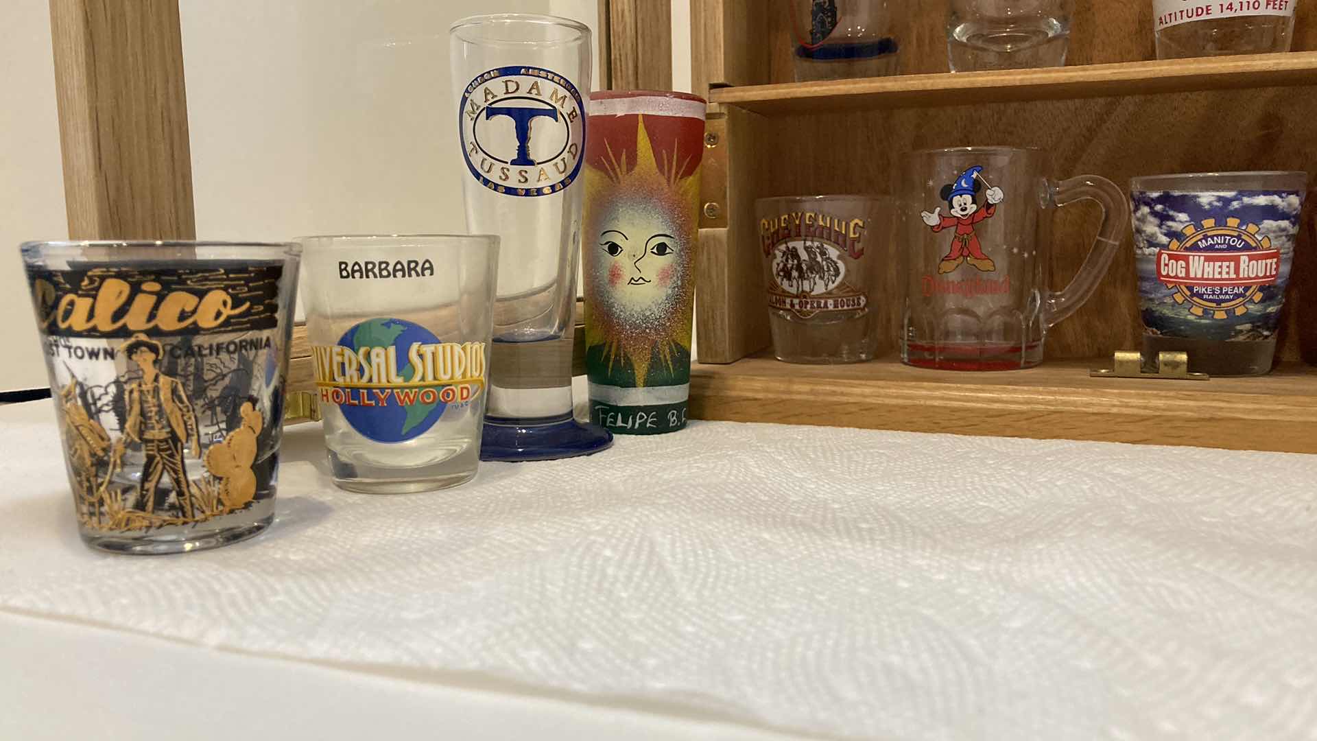 Photo 1 of SHOT GLASS COLLECTION W GLASS DOOR WOOD CABINET