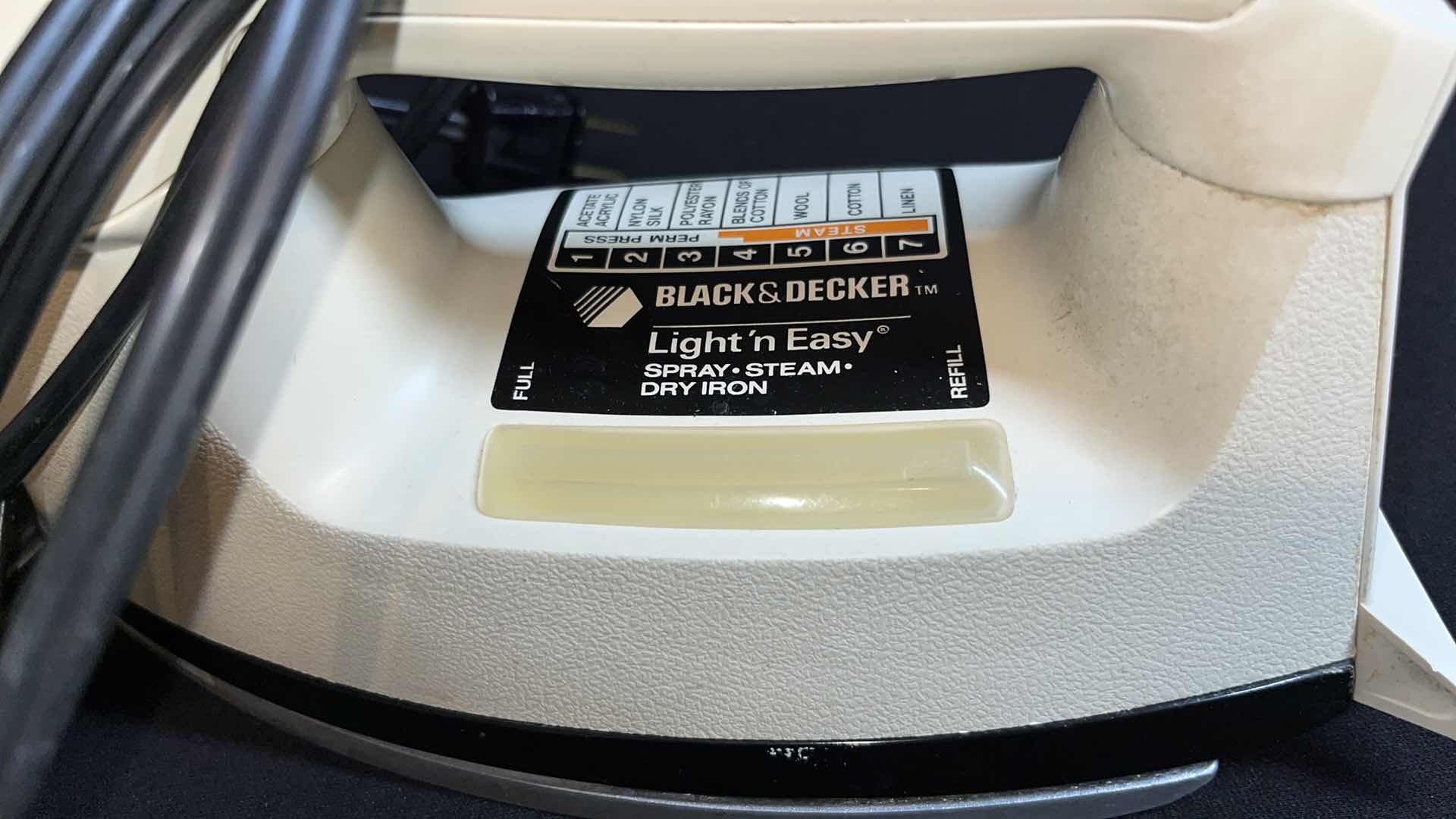 Photo 1 of BLACK&DECKER LIGHT N EASY SPRAY STEAM DRY IRON, HARTMAN PROTECH 1600 BLOW DRYER (MODEL E1600P) & VINTAGE STYLE LAUNDRY SERVICE METAL TIN DECOR 13” X 9”