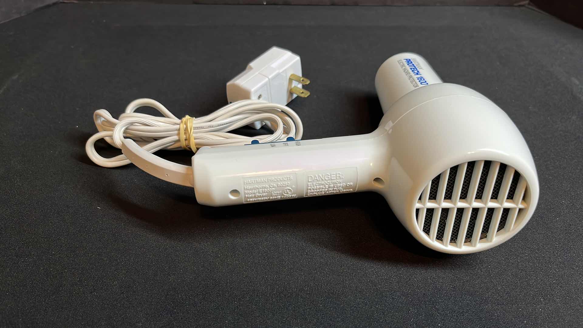 Photo 1 of BLACK&DECKER LIGHT N EASY SPRAY STEAM DRY IRON, HARTMAN PROTECH 1600 BLOW DRYER (MODEL E1600P) & VINTAGE STYLE LAUNDRY SERVICE METAL TIN DECOR 13” X 9”