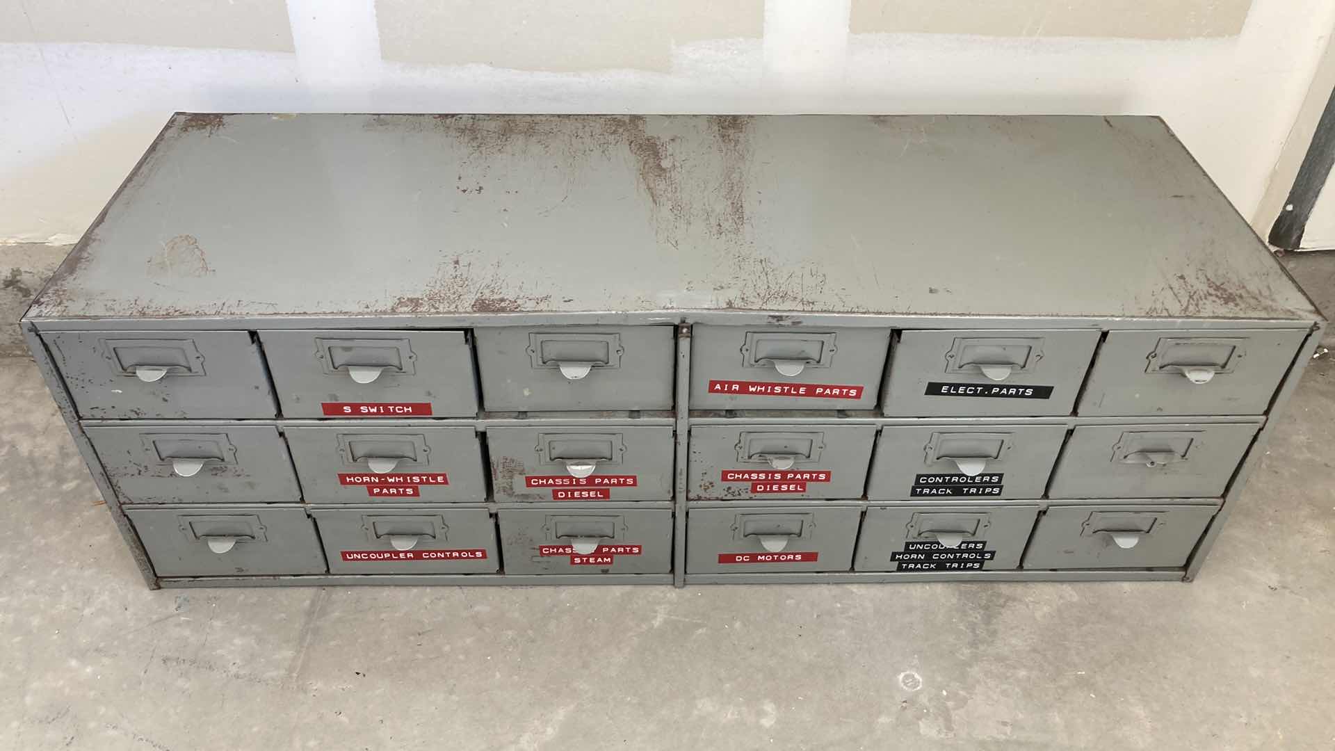 Photo 1 of 18 DRAWER STEEL STORAGE CABINET W MODEL TRAIN PARTS AS LABELED 34” X 12” H10.75”
