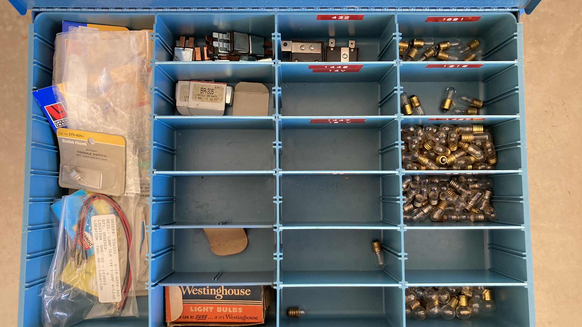 Photo 1 of BOWMAN 4 DRAWER STEEL STORAGE CABINET W MODEL TRAIN PARTS AS LABELED 20” X 16” H22”