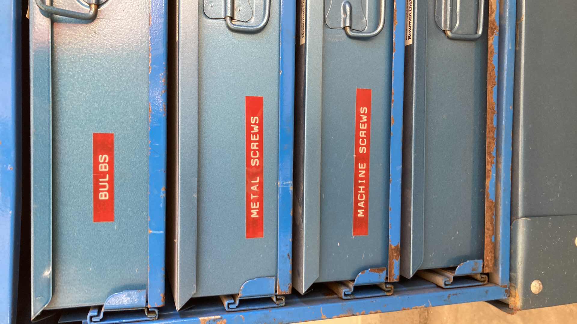 Photo 1 of BOWMAN 4 DRAWER STEEL STORAGE CABINET W MODEL TRAIN PARTS AS LABELED 20” X 16” H22”