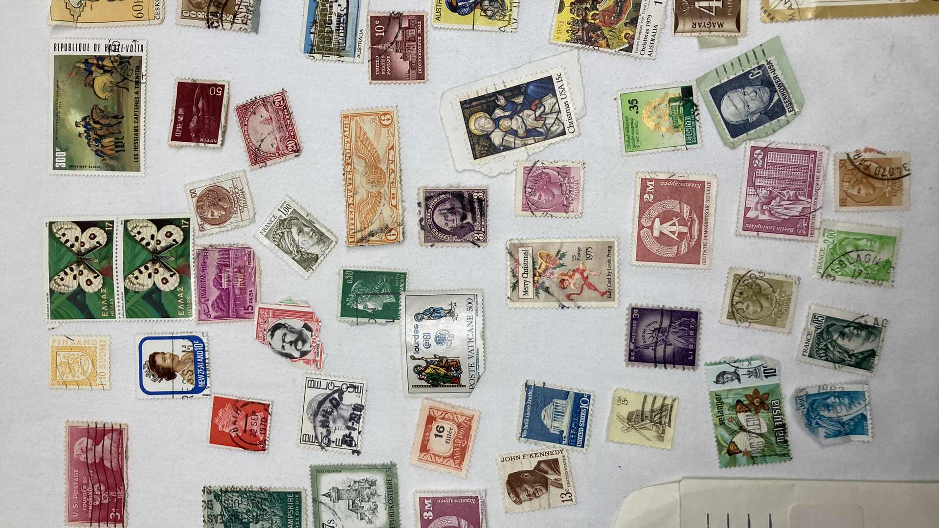 Photo 1 of STAMPS FROM AROUND THE WORLD (APPROX 75)