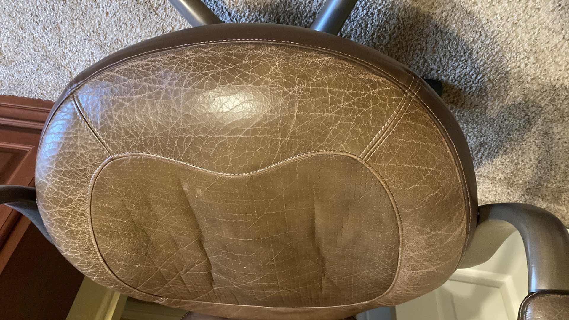 Photo 1 of TRUE SEATING BROWN LEATHER ROLLING OFFICE W PLASTIC ROLL MAT