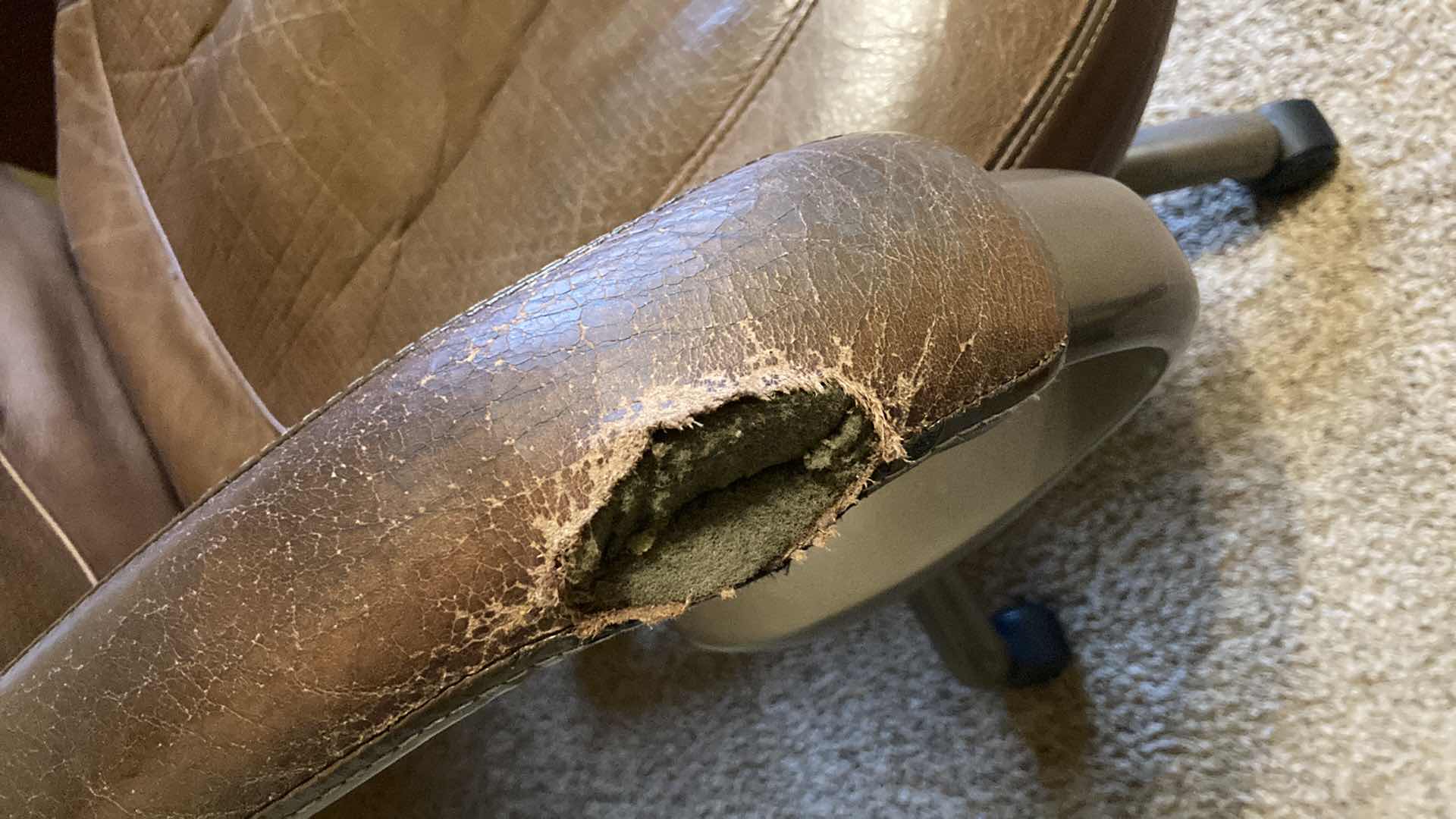 Photo 1 of TRUE SEATING BROWN LEATHER ROLLING OFFICE W PLASTIC ROLL MAT