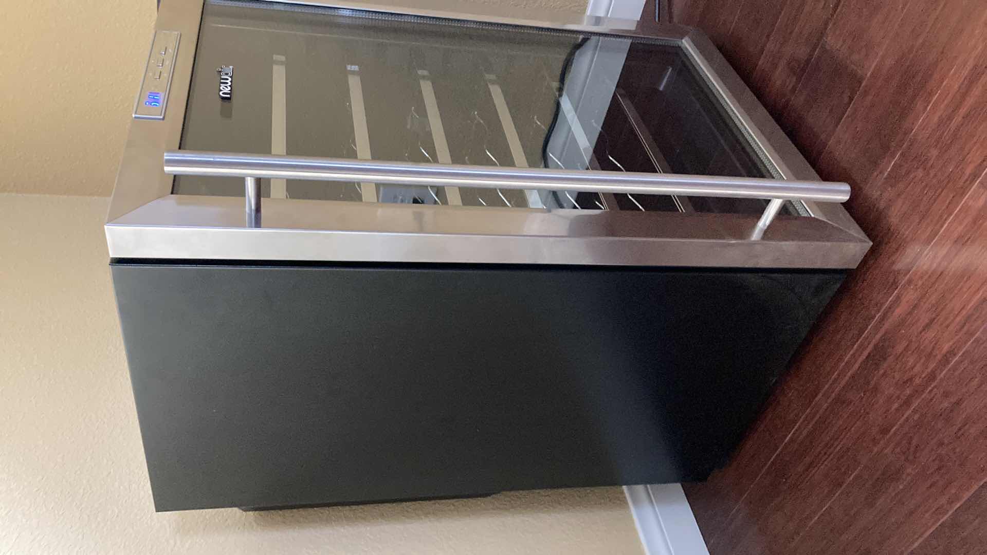 Photo 1 of NEWAIR STAINLESS STEEL & BLACK THERMOELECTRIC WINE COOLER MODEL AW-281E