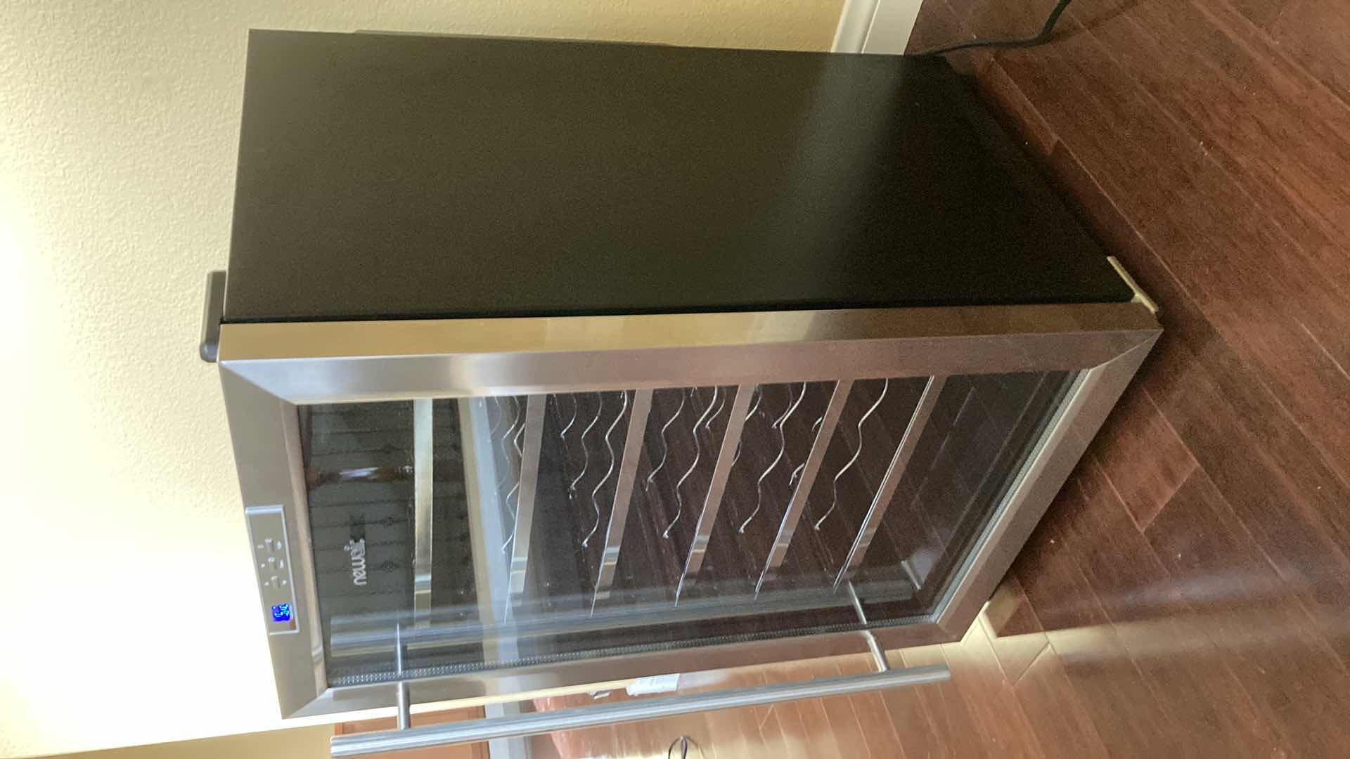 Photo 1 of NEWAIR STAINLESS STEEL & BLACK THERMOELECTRIC WINE COOLER MODEL AW-281E