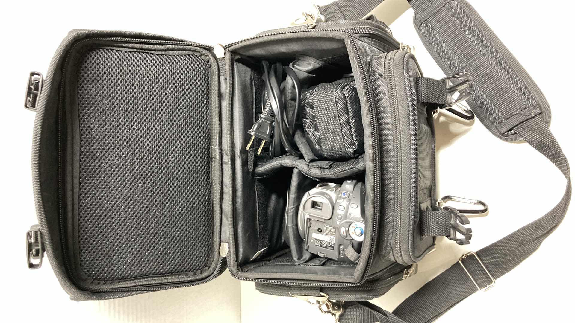 Photo 1 of PANASONIC DVD VIDEO CAMERA MODEL VDR-D220 & CANON POWERSHOT DIGITAL CAMERA MODEL SD750 W CHARGERS, BATTERIES & EXPEDITION OUTFITTERS CAMERA BAG