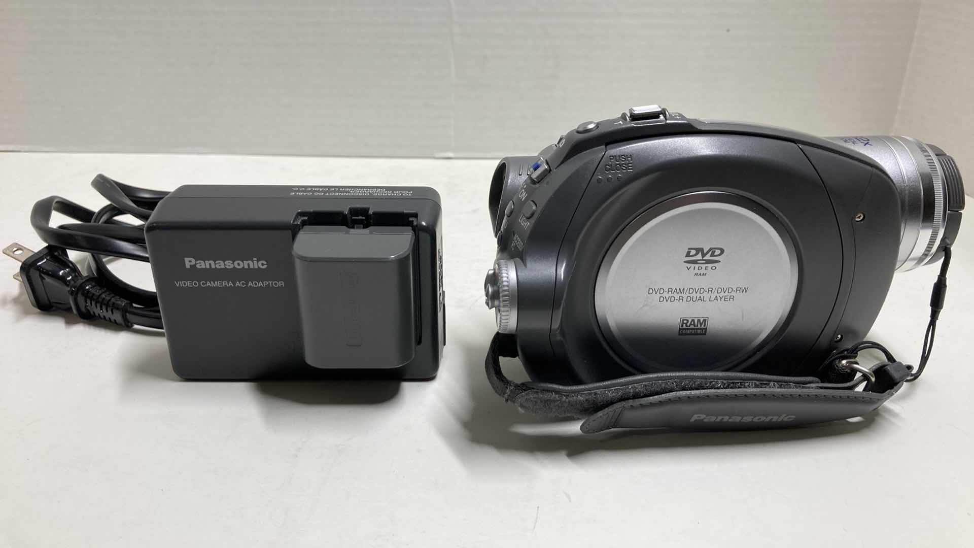 Photo 1 of PANASONIC DVD VIDEO CAMERA MODEL VDR-D220 & CANON POWERSHOT DIGITAL CAMERA MODEL SD750 W CHARGERS, BATTERIES & EXPEDITION OUTFITTERS CAMERA BAG