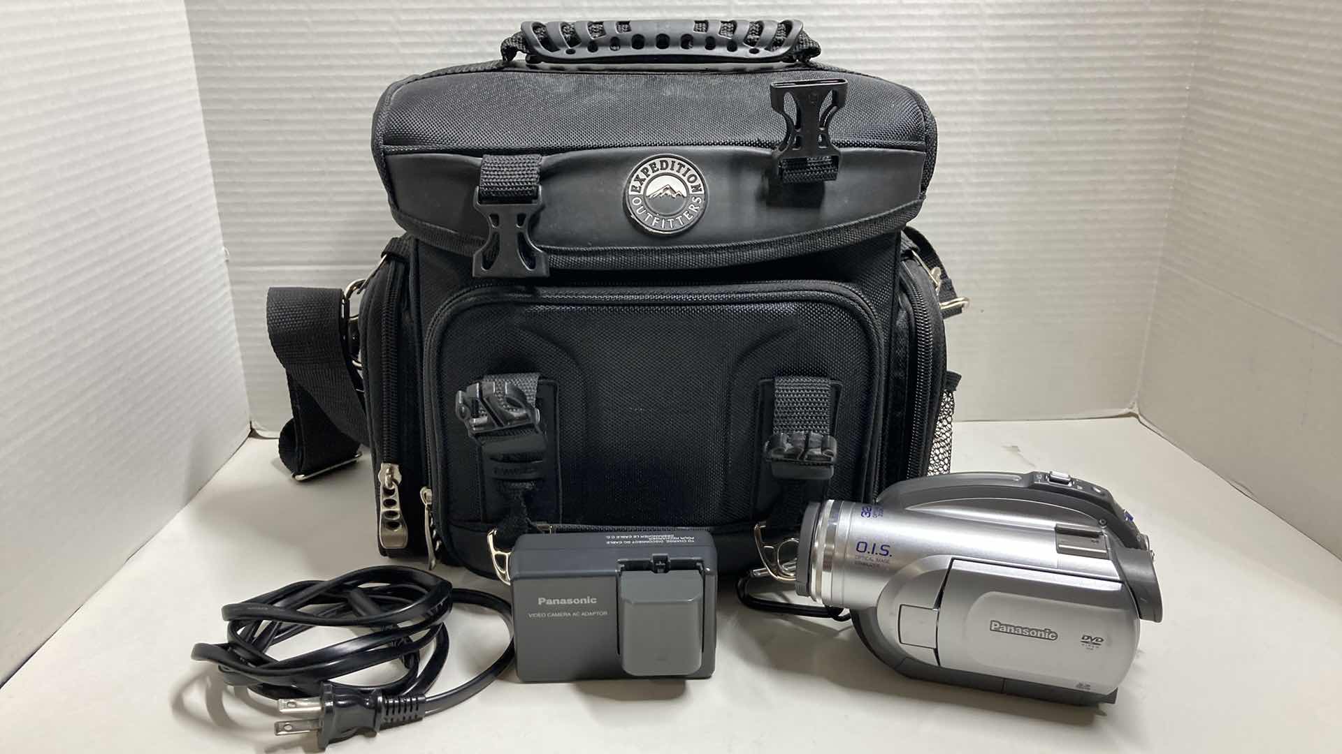 Photo 1 of PANASONIC DVD VIDEO CAMERA MODEL VDR-D220 & CANON POWERSHOT DIGITAL CAMERA MODEL SD750 W CHARGERS, BATTERIES & EXPEDITION OUTFITTERS CAMERA BAG