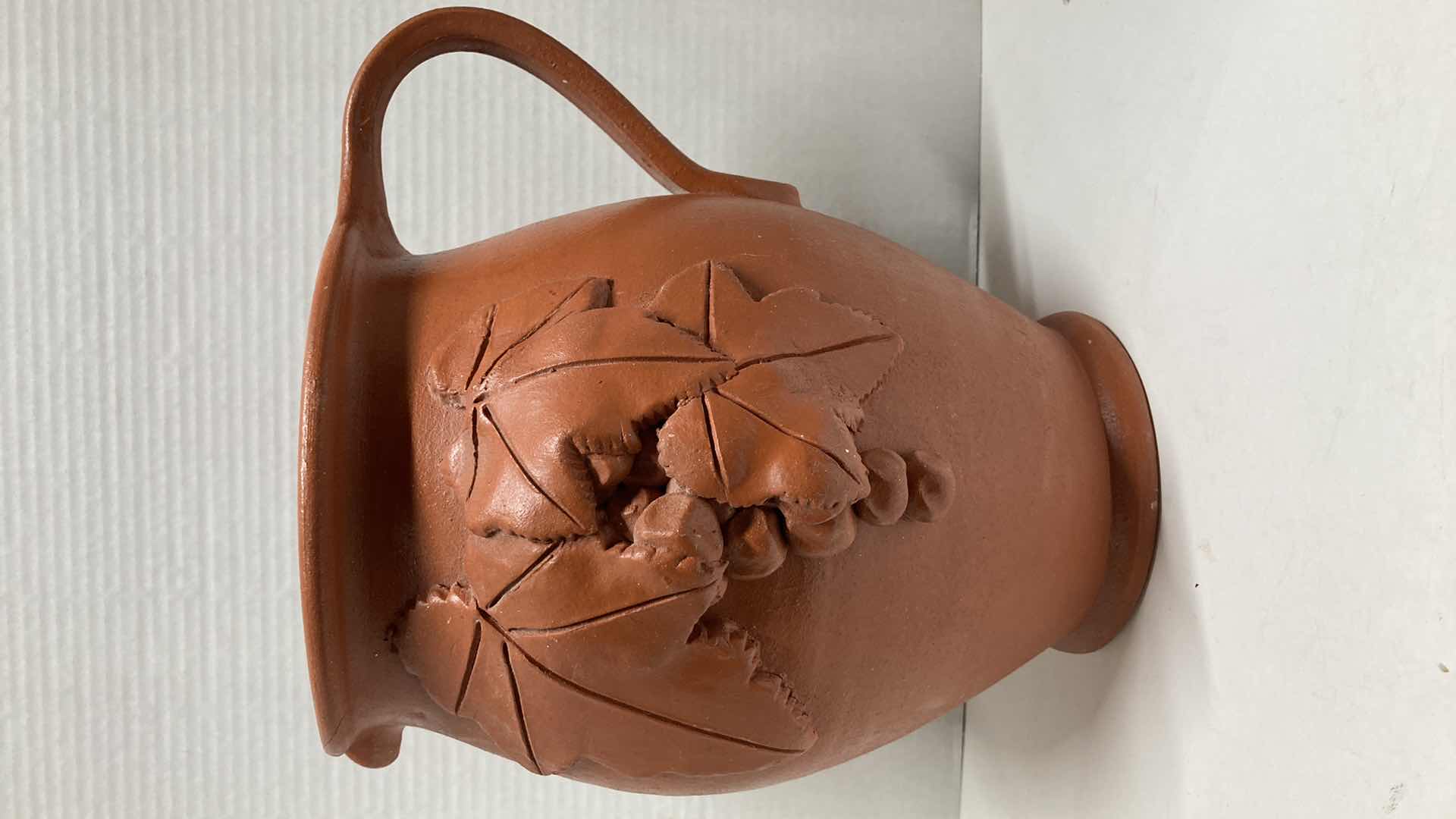 Photo 1 of GRAPEVINE DECORATIVE CLAY PITCHER 10” X 8” H10.5”