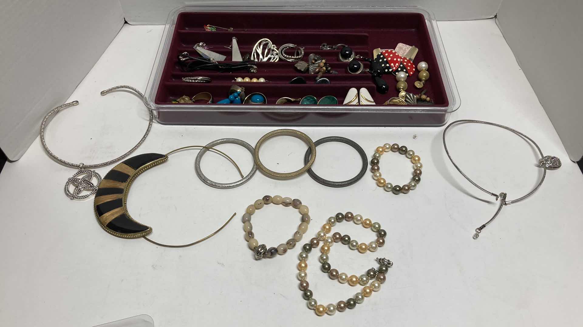 Photo 1 of FASHION JEWELRY- EARRINGS, NECKLACES & BRACELETS W JEWELRY DISPLAY STORAGE BOX 16” X 9” H1.75”