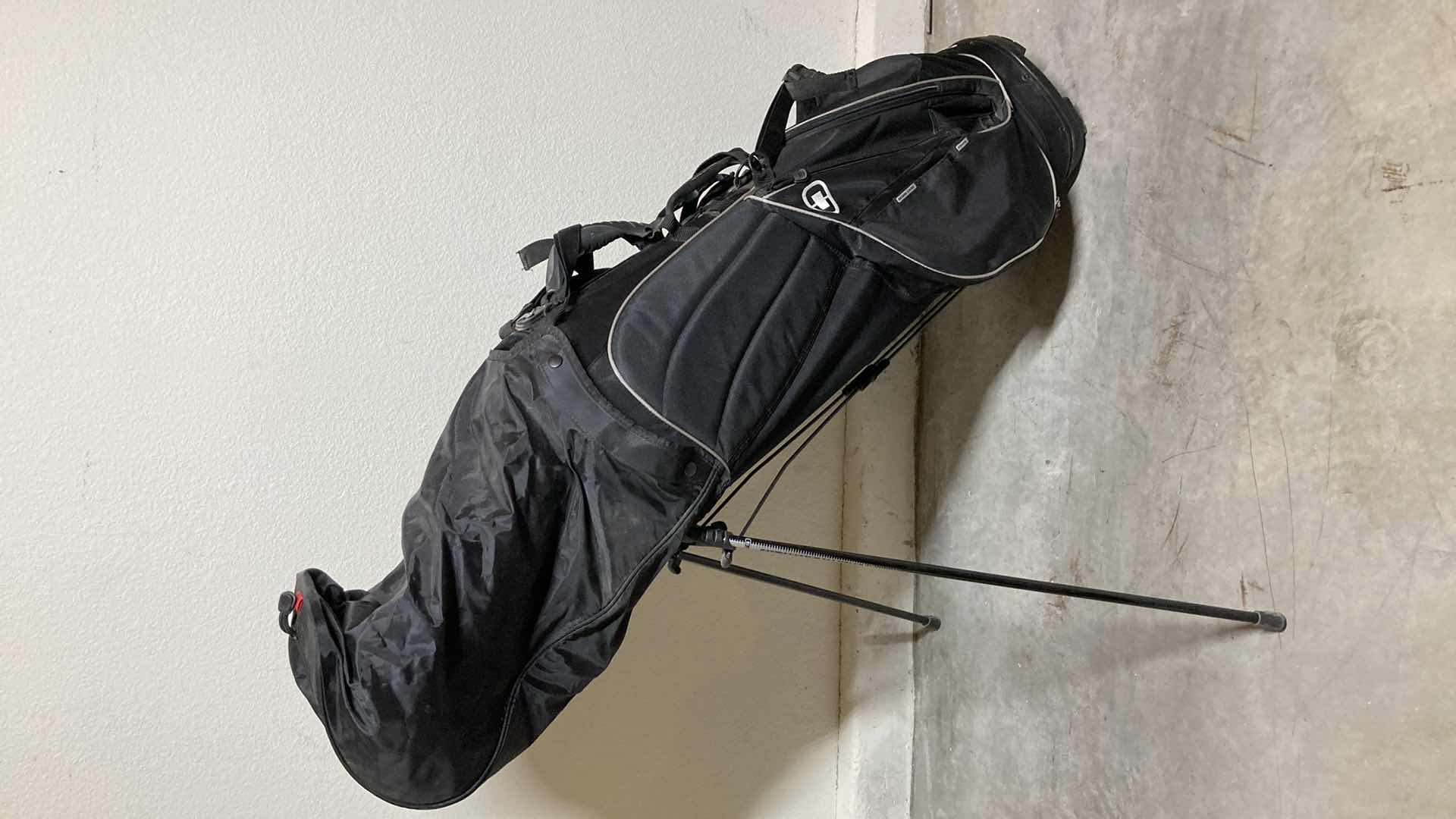 Photo 1 of OGIO VECTOR BLACK GOLF BAG W ALL TERRAIN STABILITY STAND, BALL SILO & ARC CLUB MANAGEMENT SYSTEM