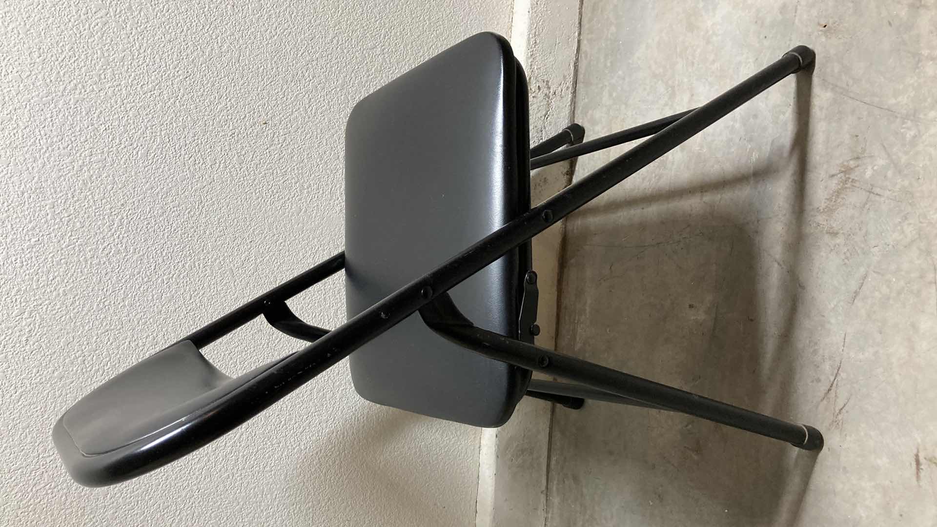 Photo 1 of BLACK PADDED METAL FOLDING CHAIR 17” X 16” H30”