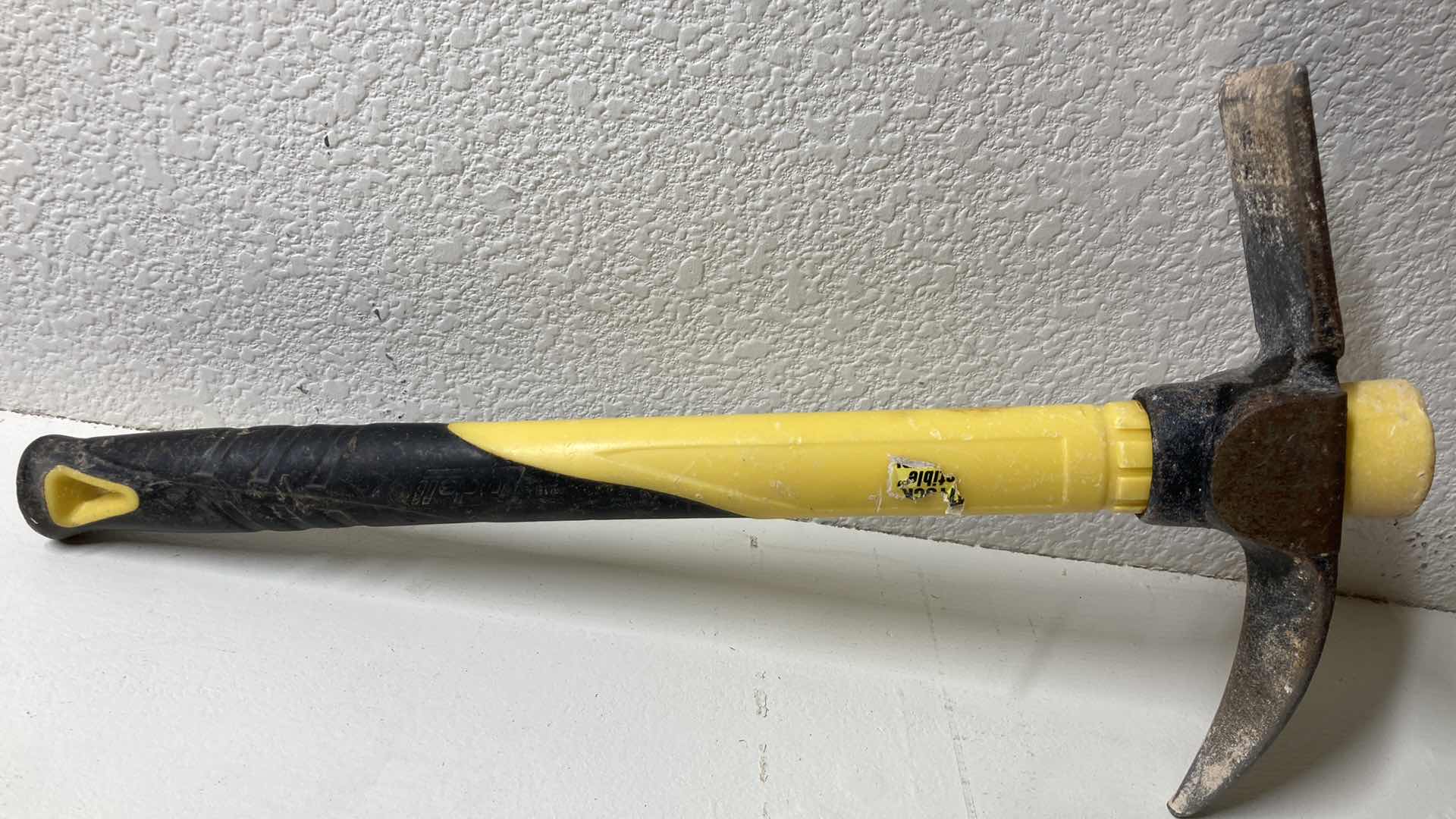 Photo 1 of TRUE TEMPER WOOD HANDLED HATCHET & LUDELL FIBERGLASS HANDLED HAND HELD PICK AXE