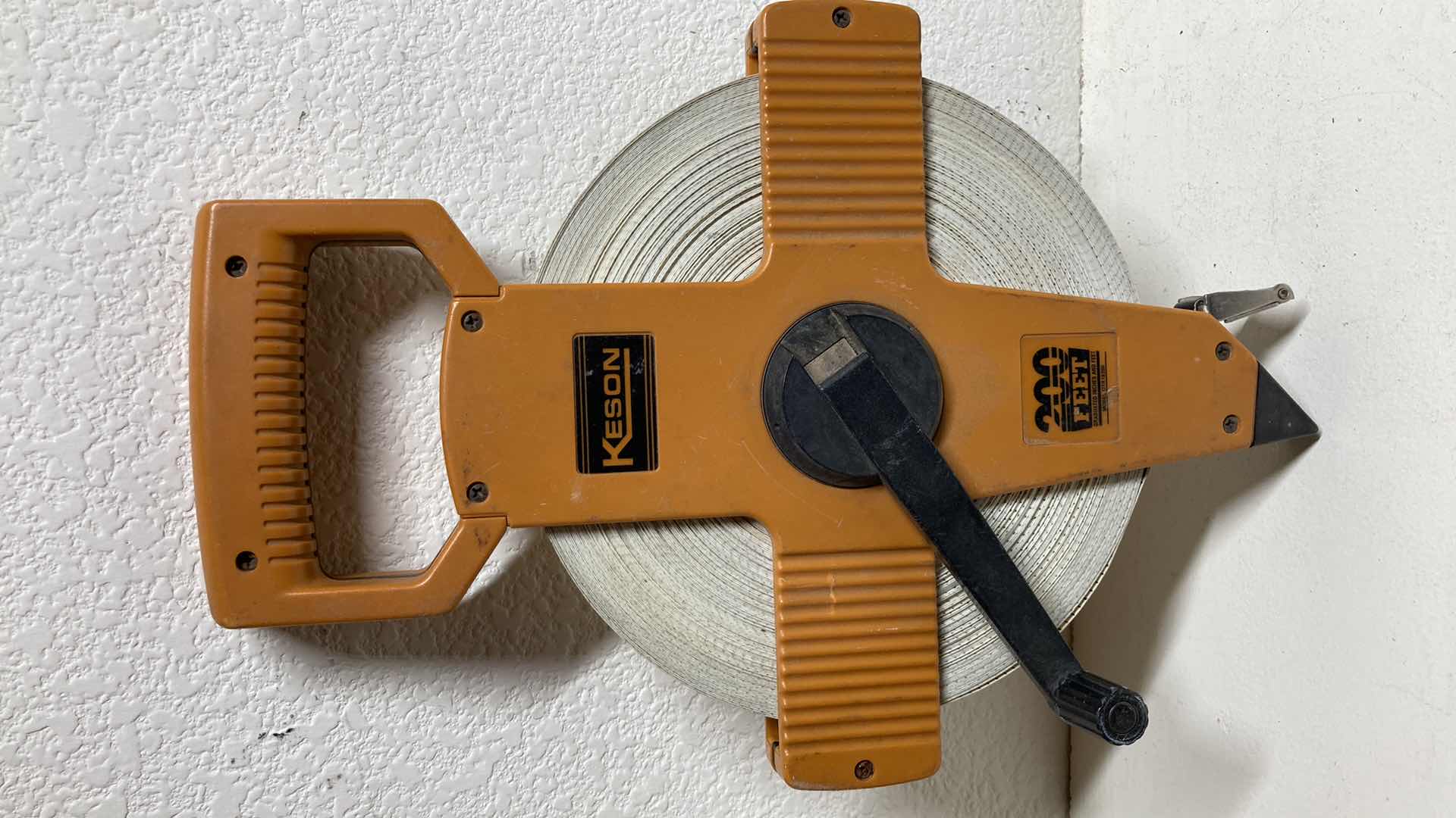 Photo 1 of KESON 200FT MEASURING TAPE MODEL OTR18200