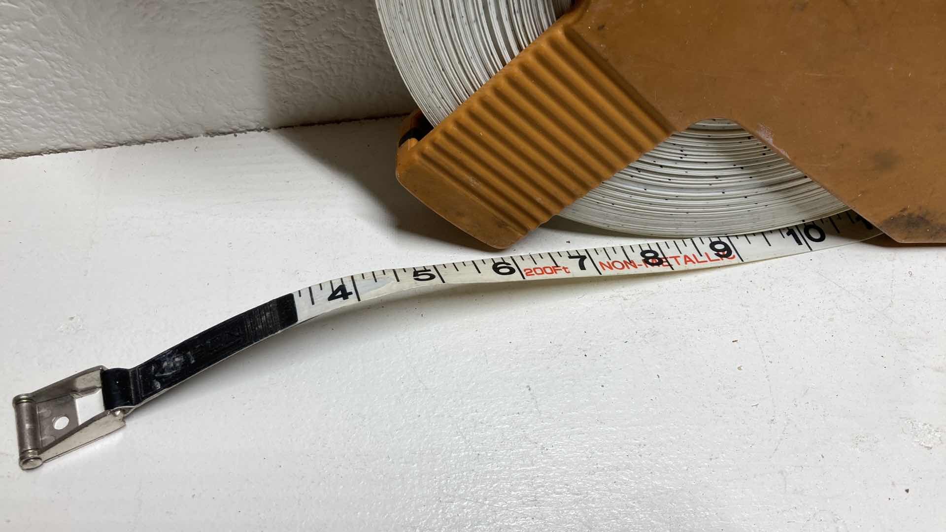 Photo 1 of KESON 200FT MEASURING TAPE MODEL OTR18200