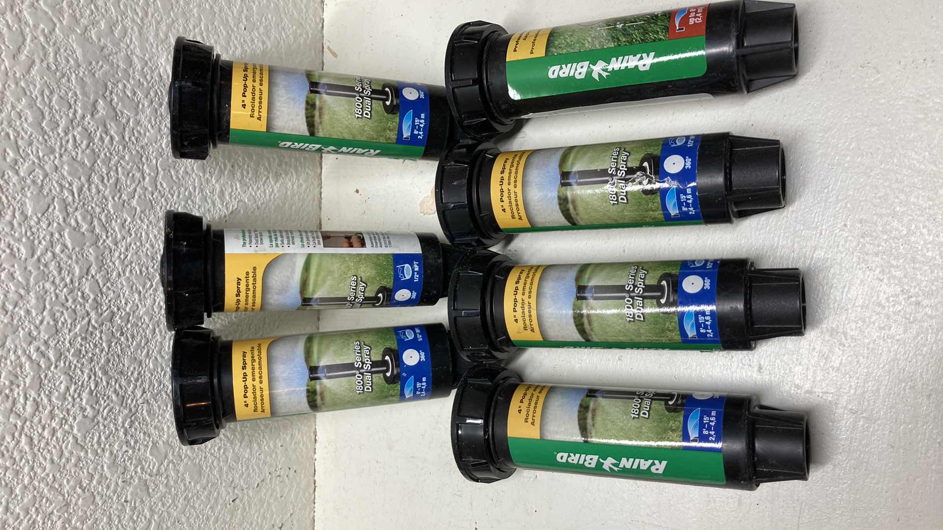 Photo 1 of NEW RAINBIRD 1800 SERIES 4” DUAL SPRAY SPRINKLERS (7) W CUT OFF RISERS 0.5” X 6”