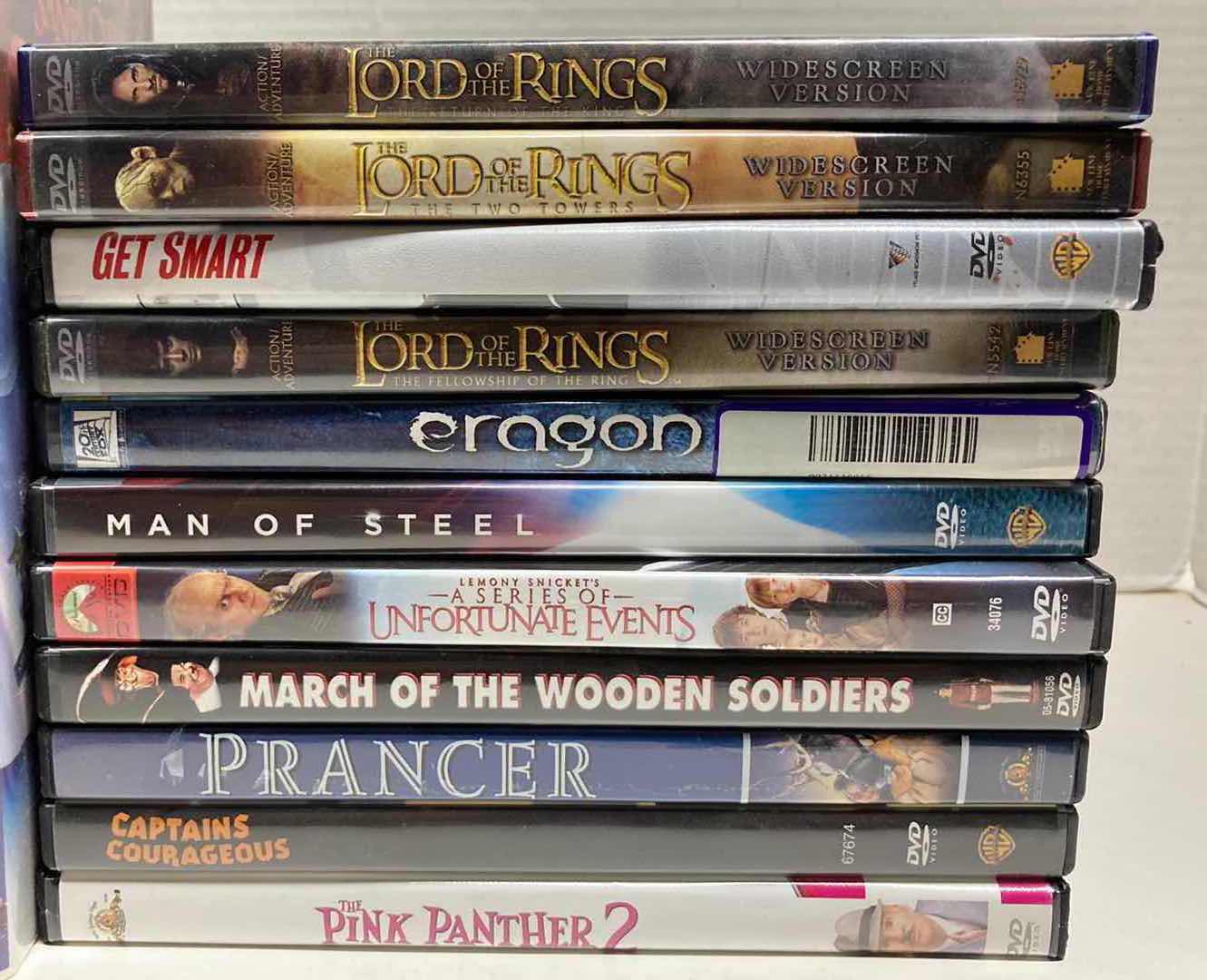 Photo 1 of FAMILY MOVIES-DVDs (11) & VHS (4)