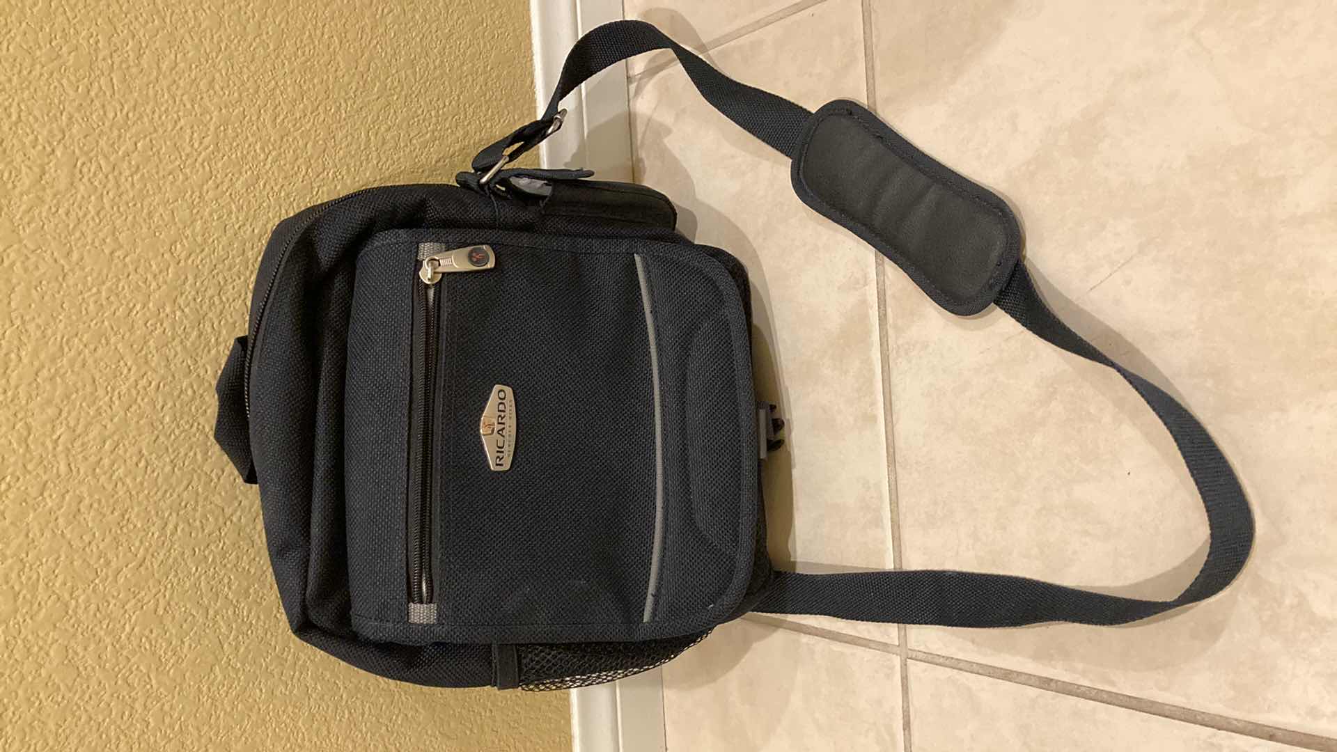 Photo 1 of RICARDO BLACK LUGGAGE SET- ROLLING CARRY ON BAG, SHOULDER BAG & DUFFLE BAG (3)