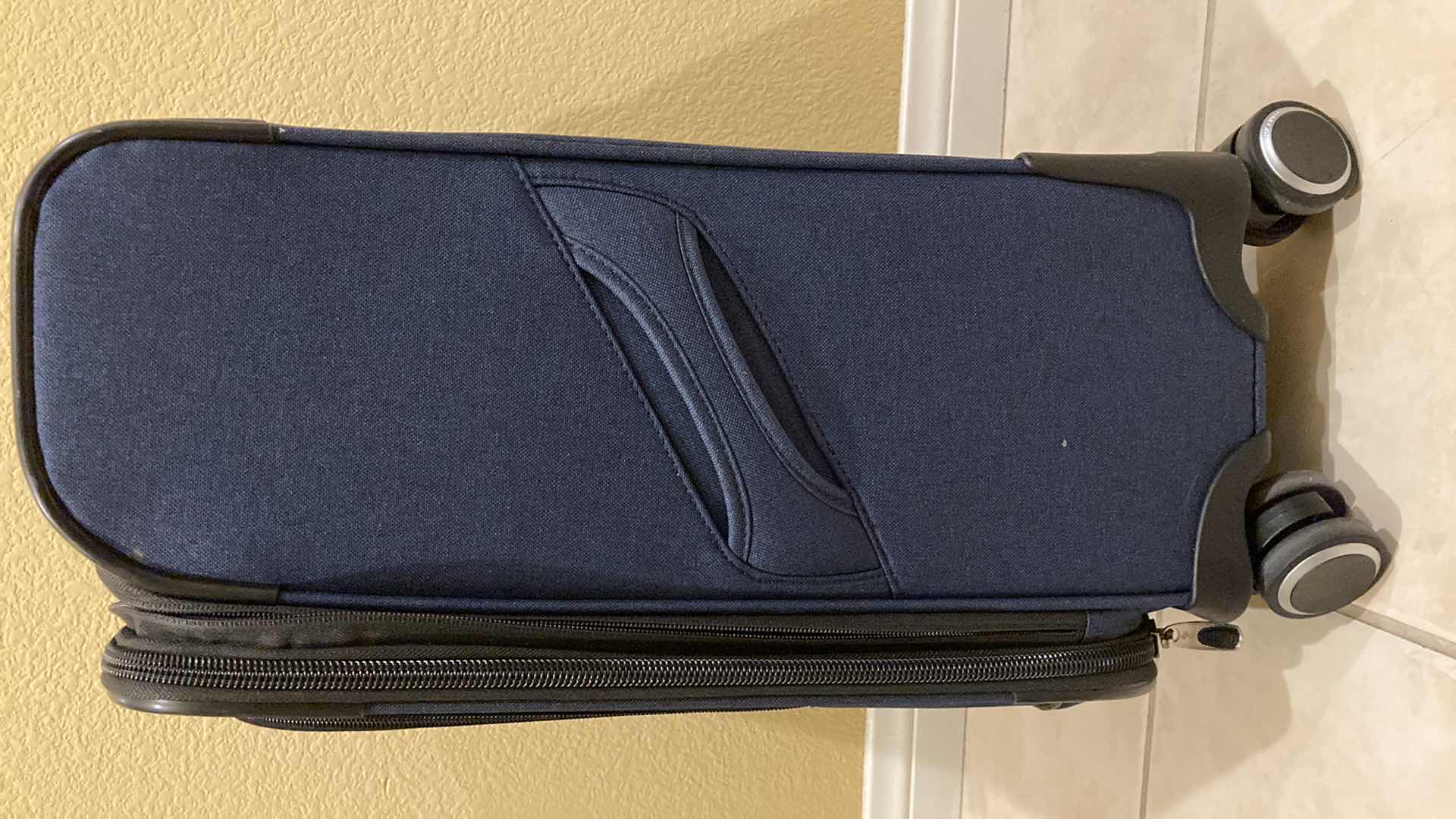 Photo 1 of RICARDO NAVY BLUE ROLLING CARRY ON BAG