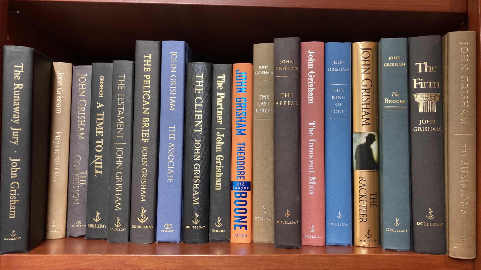 Photo 1 of JOHN GRISHAM HARD COVER BOOKS (17)