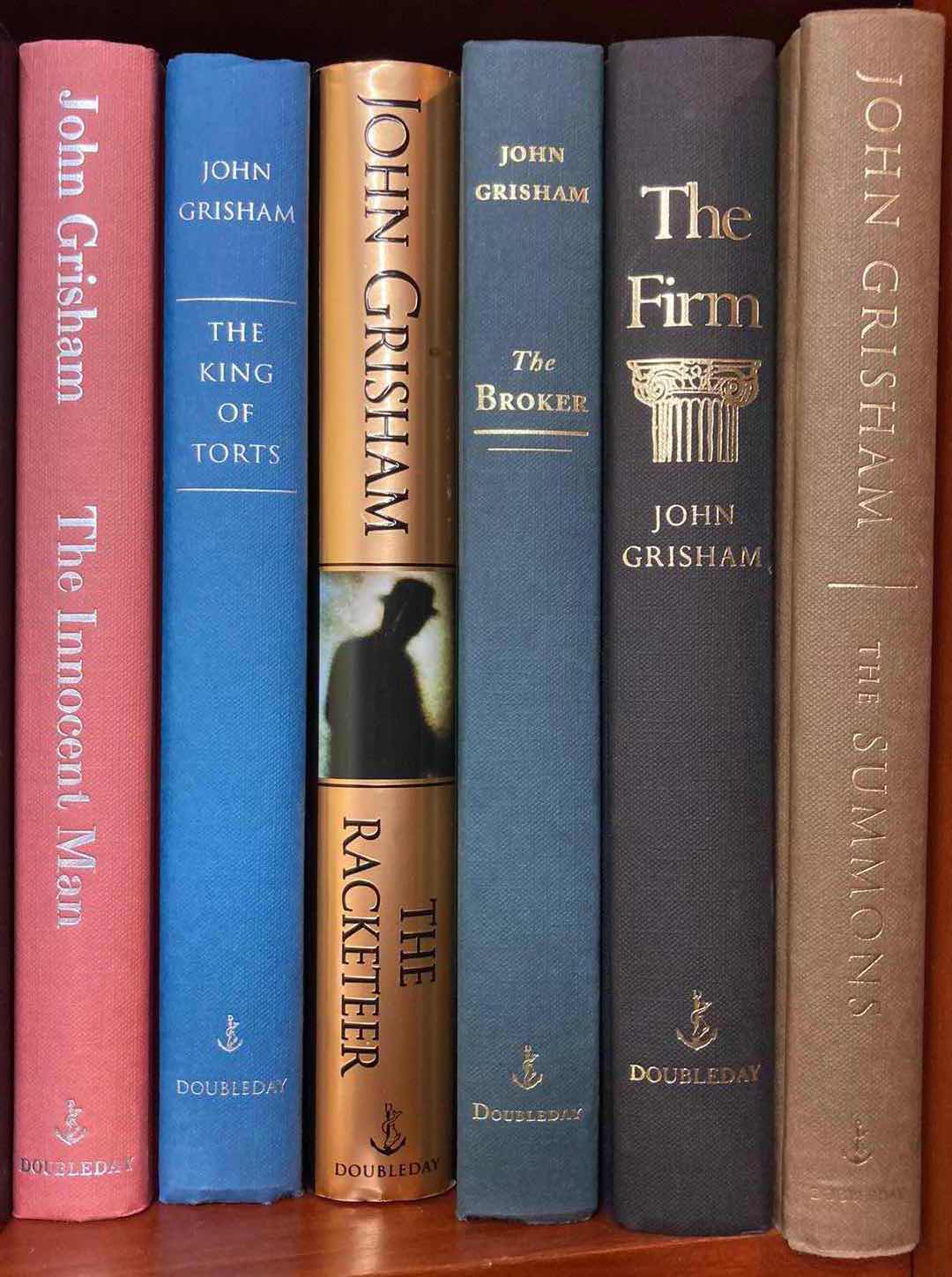 Photo 1 of JOHN GRISHAM HARD COVER BOOKS (17)