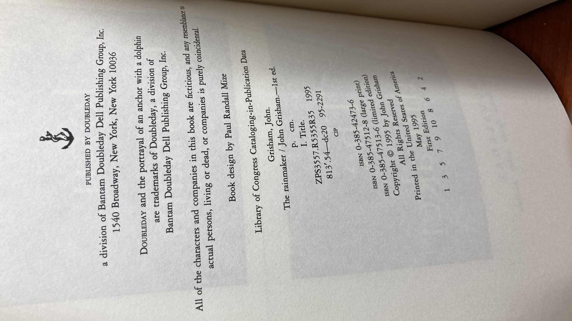 Photo 1 of THE RAINMAKER AUTOGRAPHED BY JOHN GRISHAM HARD COVER BOOK